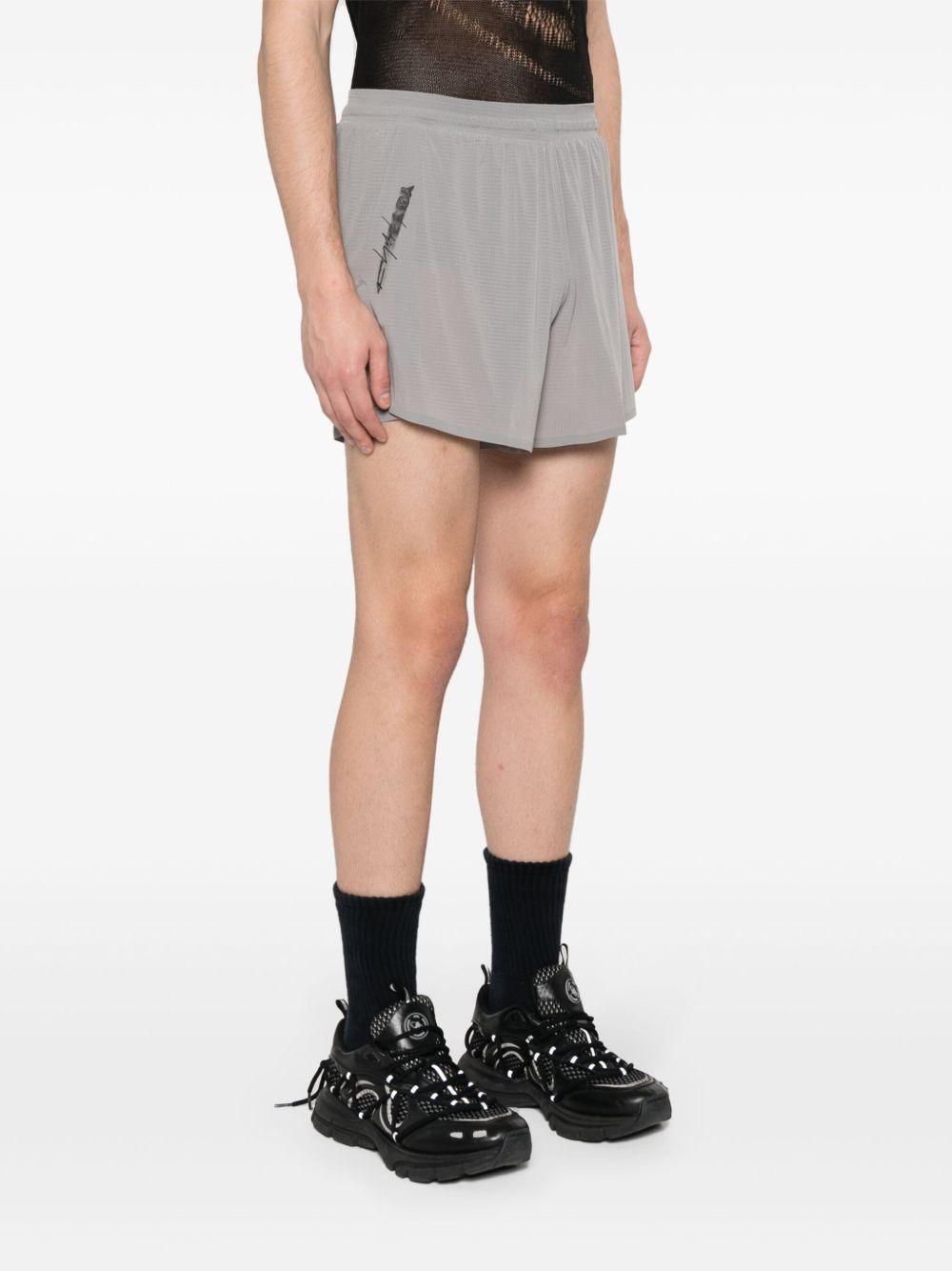 checked running shorts Product Image