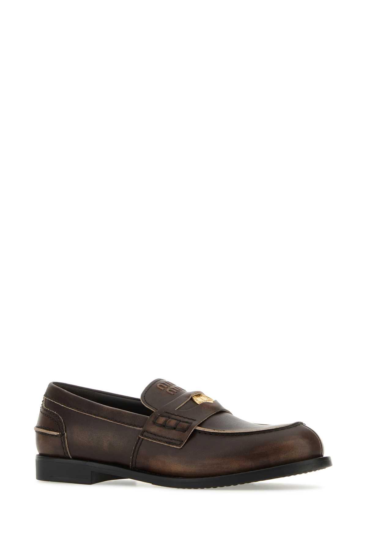MIU MIU Leather Distressed Penny Loafers In Brown Product Image