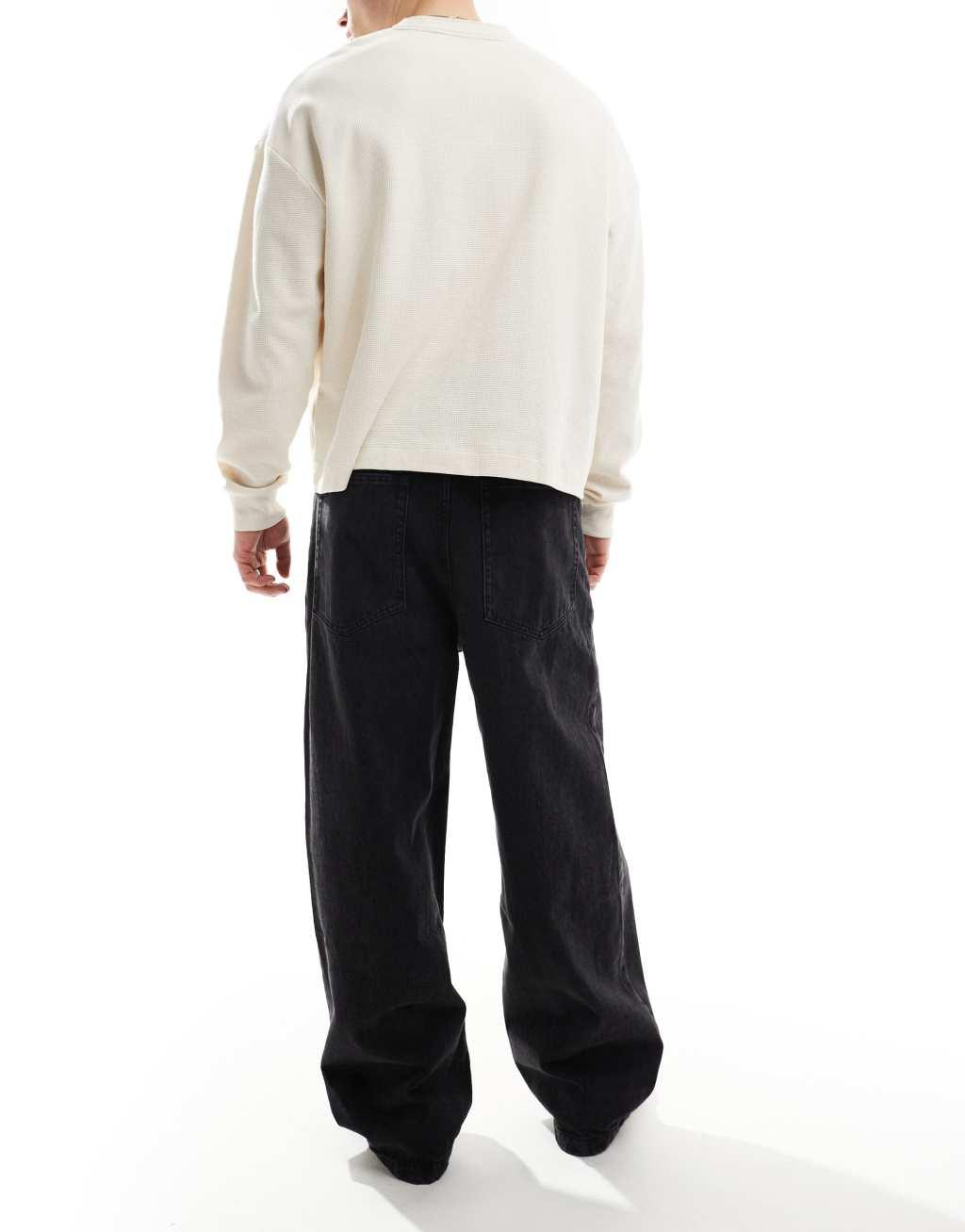 Bershka super baggy fit jeans in solid black Product Image