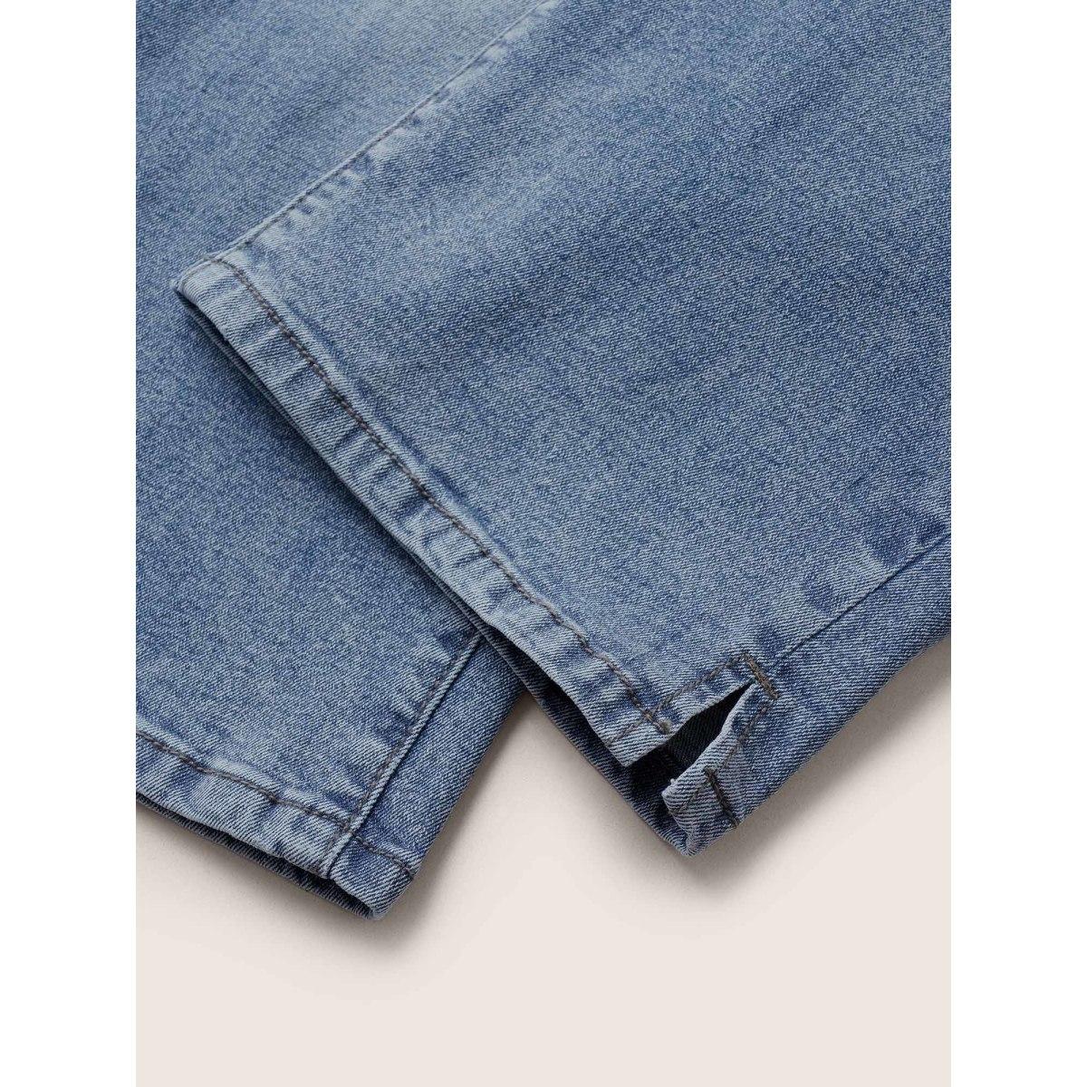 Plus Size Light Wash Slit Hem Pull On Jegging Jeans Women Blue Casual Plain Button High stretch Slanted pocket Jeans BloomChic 16/1X Product Image