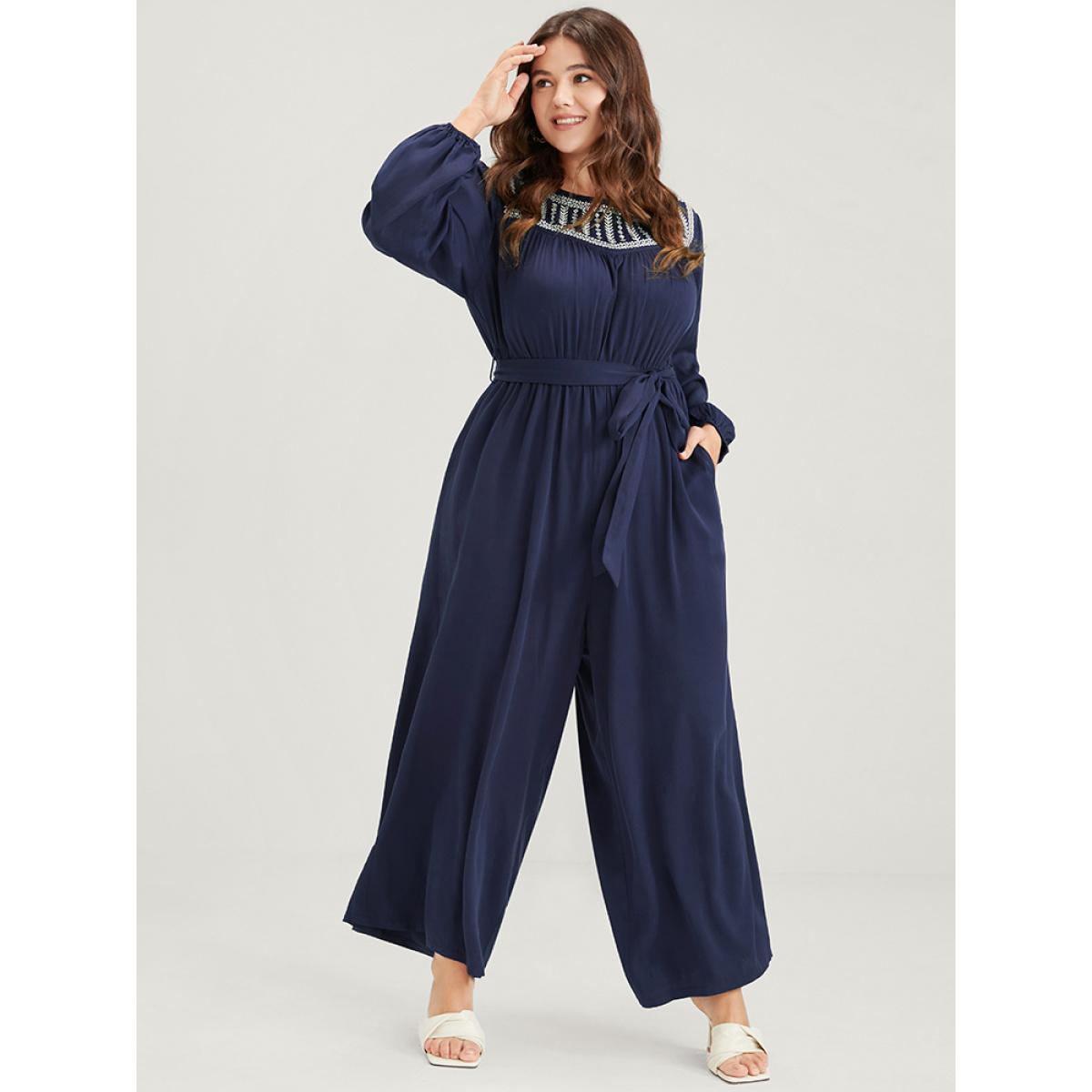 Plus Size DarkBlue Solid Pocket Lantern Sleeve Embroidered Belted Jumpsuit Women Elegant Long Sleeve Round Neck Dailywear Loose Jumpsuits BloomChic 14-16/1X Product Image
