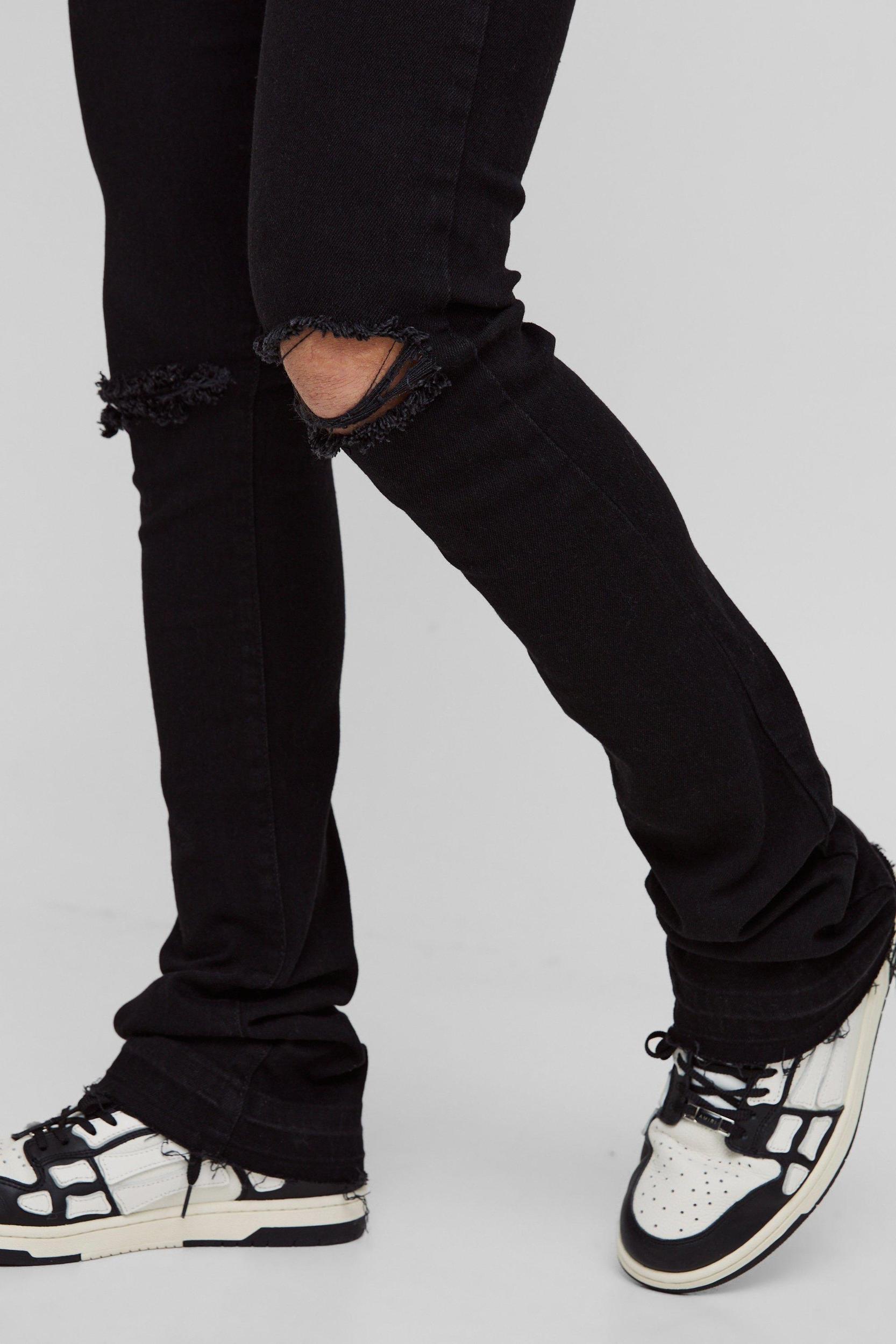 Skinny Stacked Flared Ripped Knee Jeans | boohooMAN USA Product Image