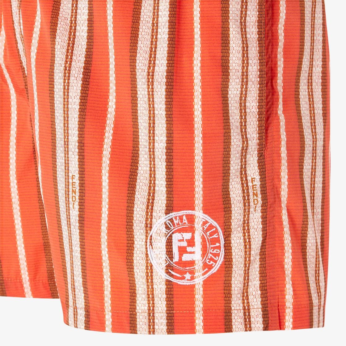 TopMulticolor-stripe organic cotton knit top Product Image