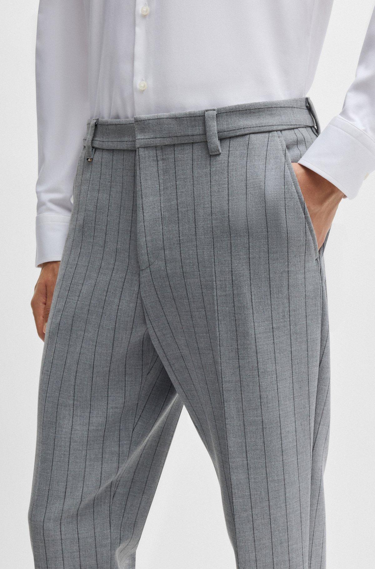 Tapered-fit trousers in pinstripe stretch fabric Product Image