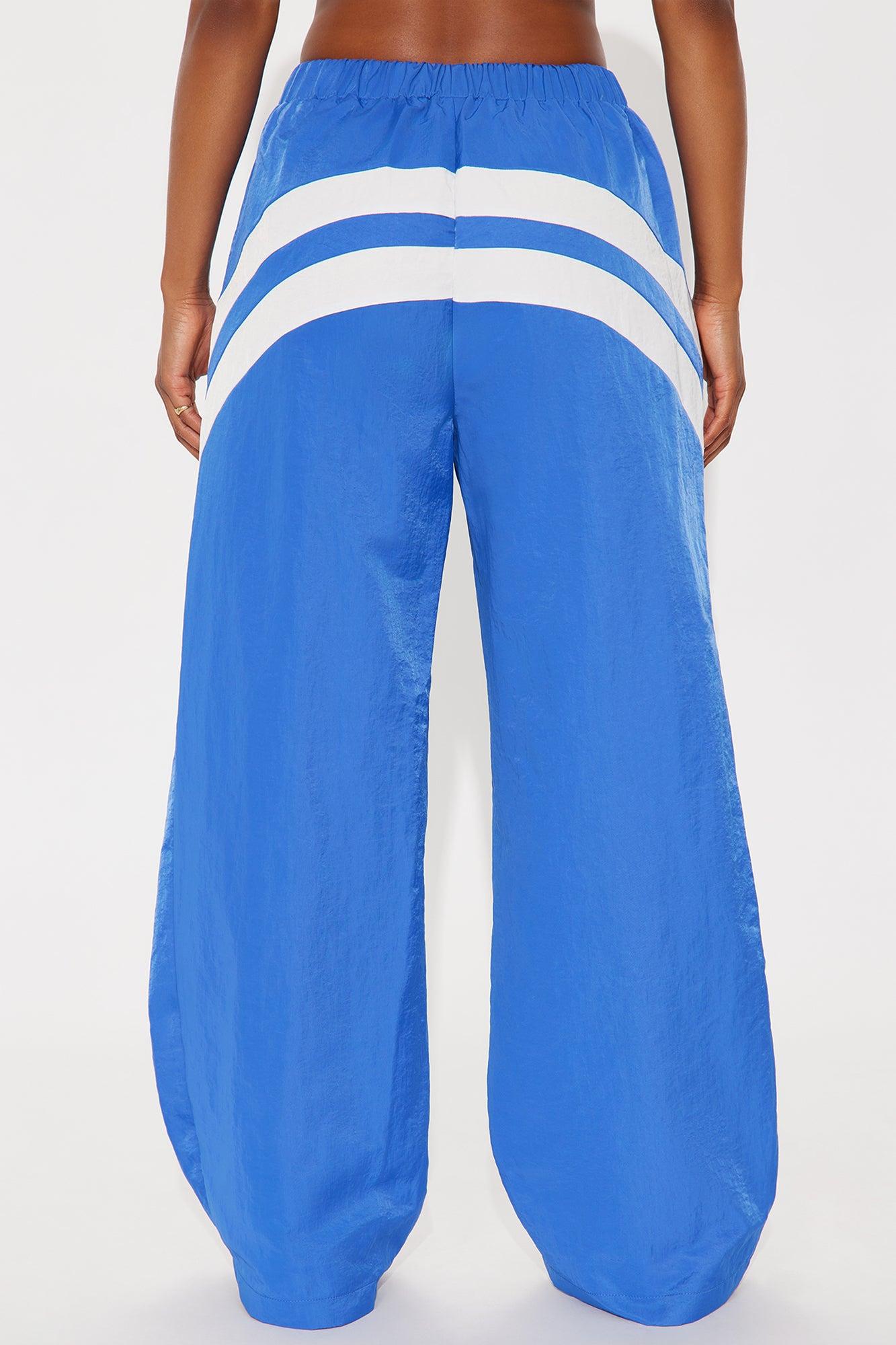 Follow The Curve Windbreaker Track Pant - Blue Female Product Image