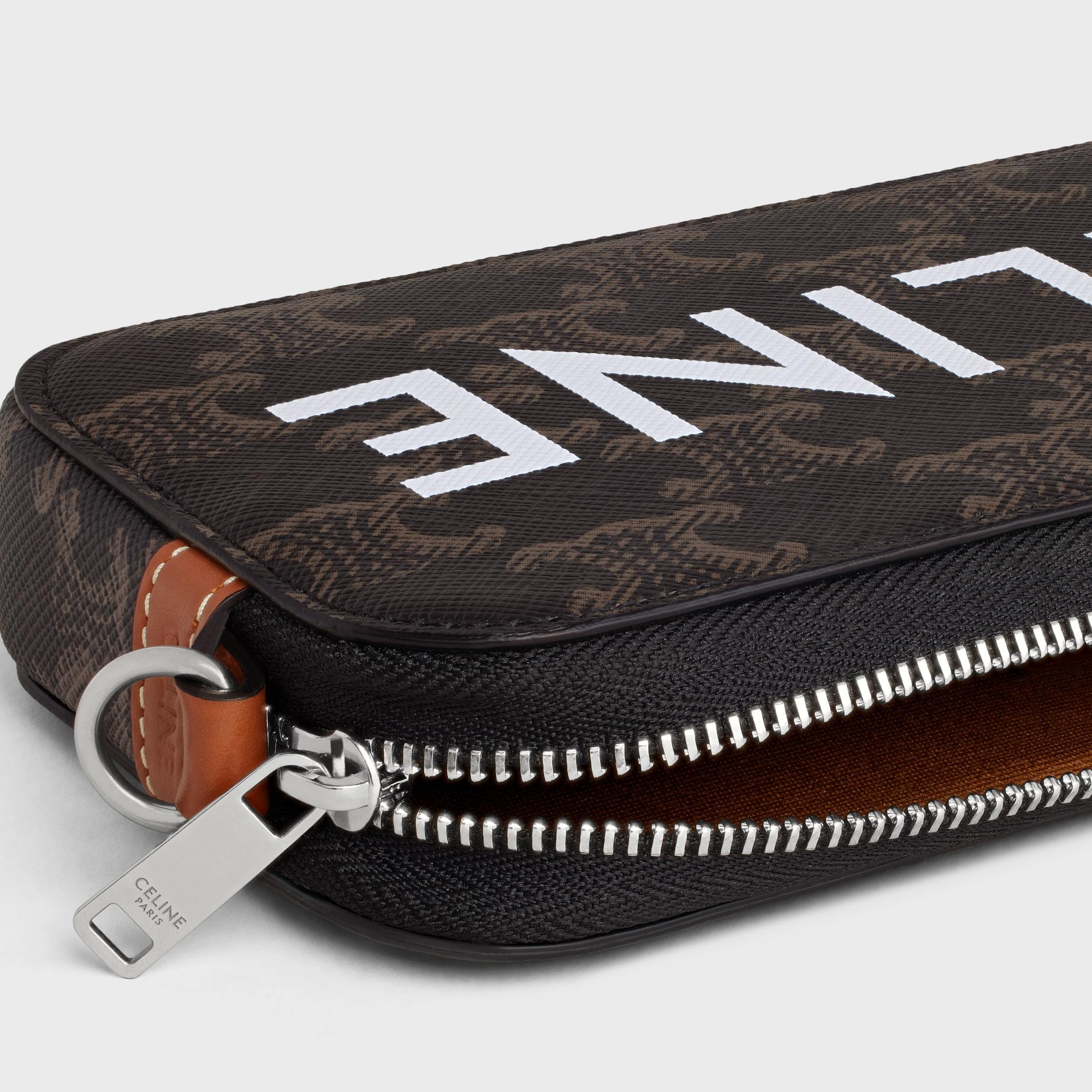 Horizontal pouch in Triomphe canvas with celine print Product Image