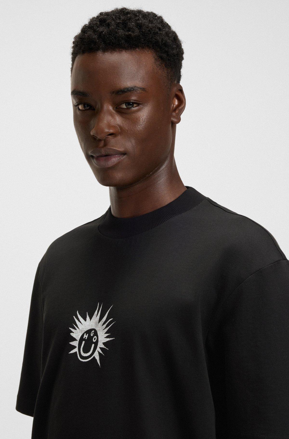 Cotton-jersey T-shirt with Happy HUGO artwork Product Image