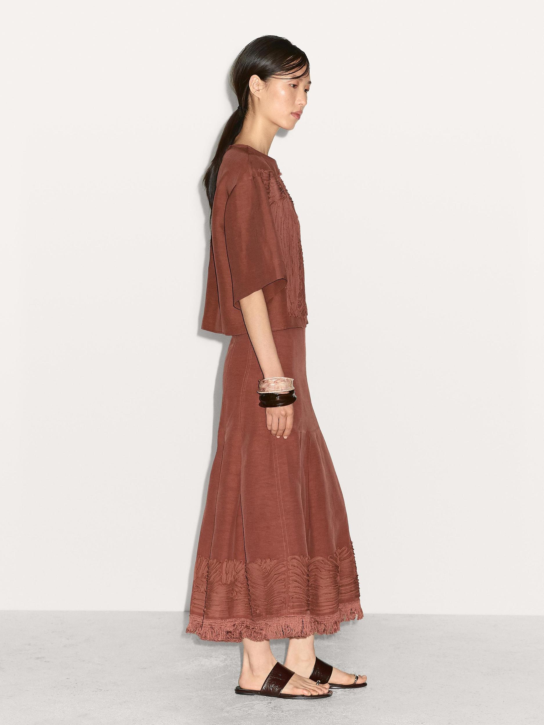 Flowing top with embroidered detail Product Image