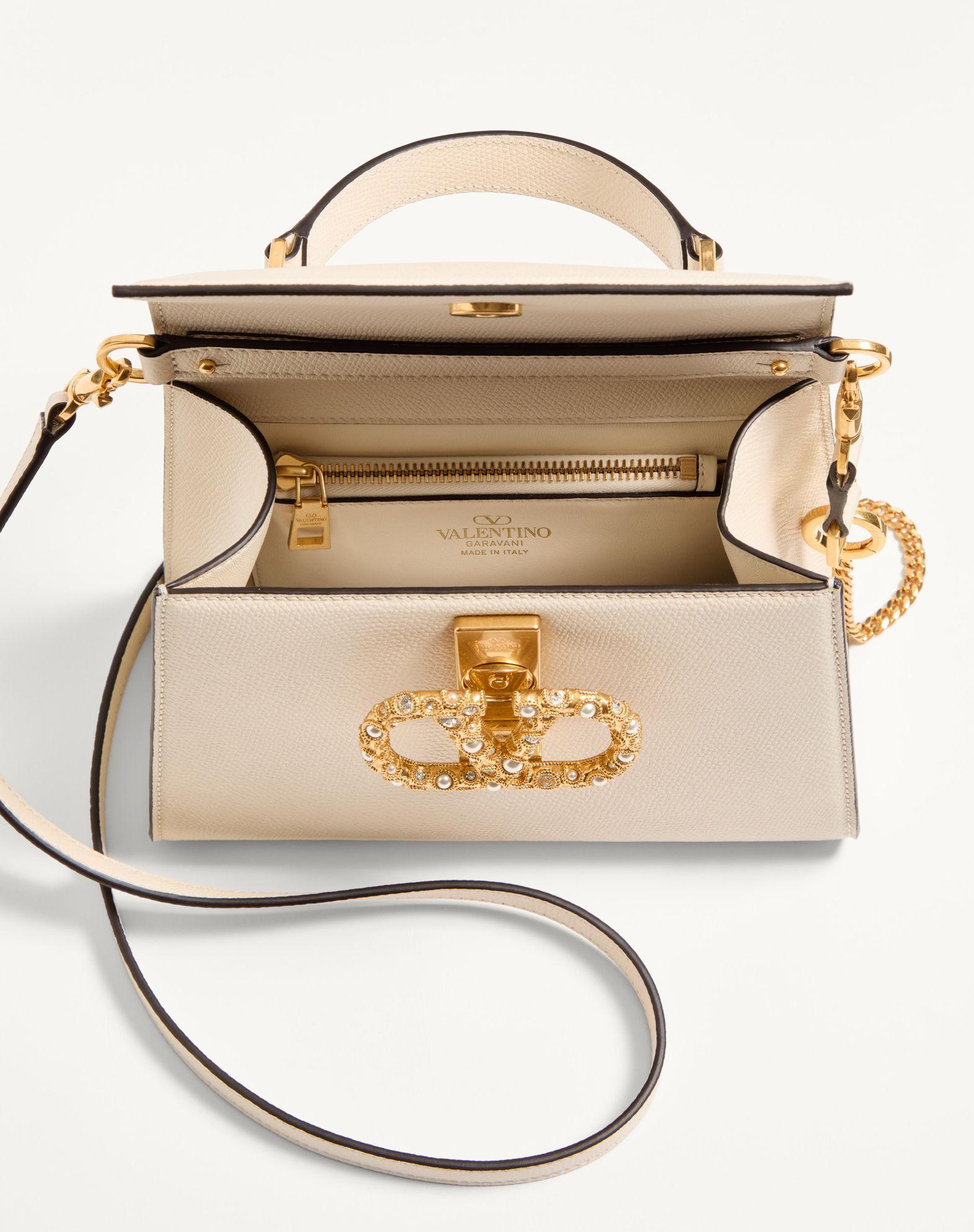 Valentino Garavani Vsling Small Handbag In Grainy Calfskin With Jewel Logo Product Image