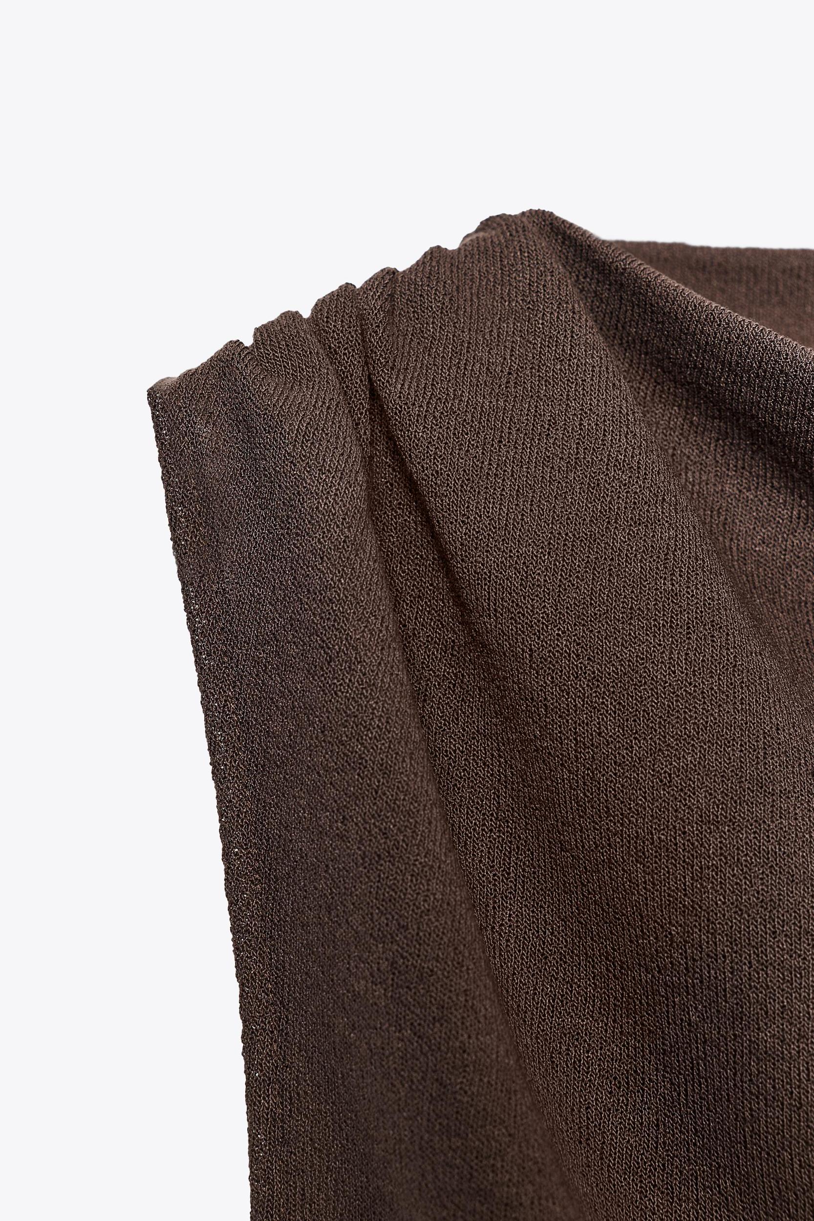 CUT-OUT KNIT TOP Product Image