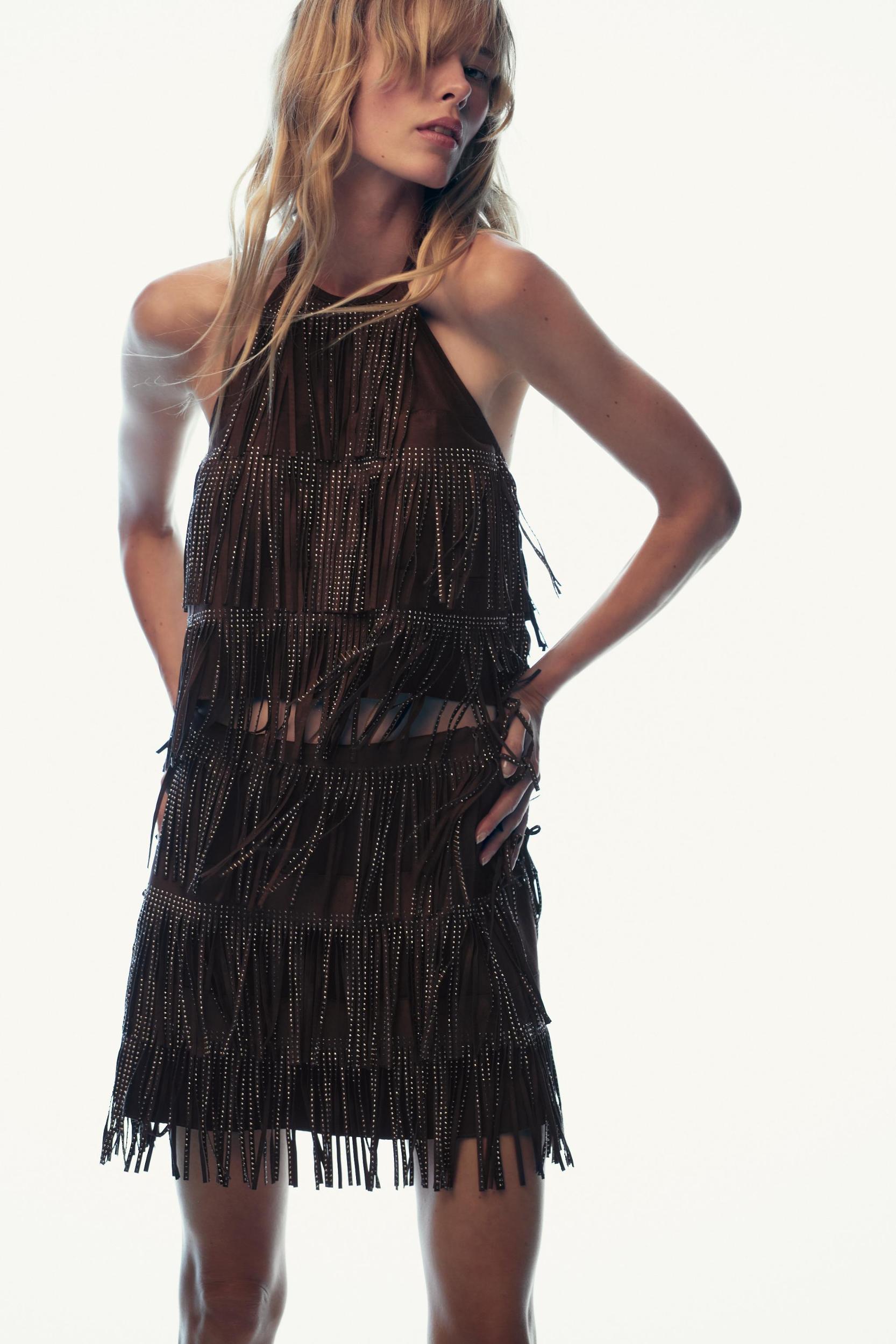 SHIMMERING FAUX SUEDE FRINGE SKIRT Product Image