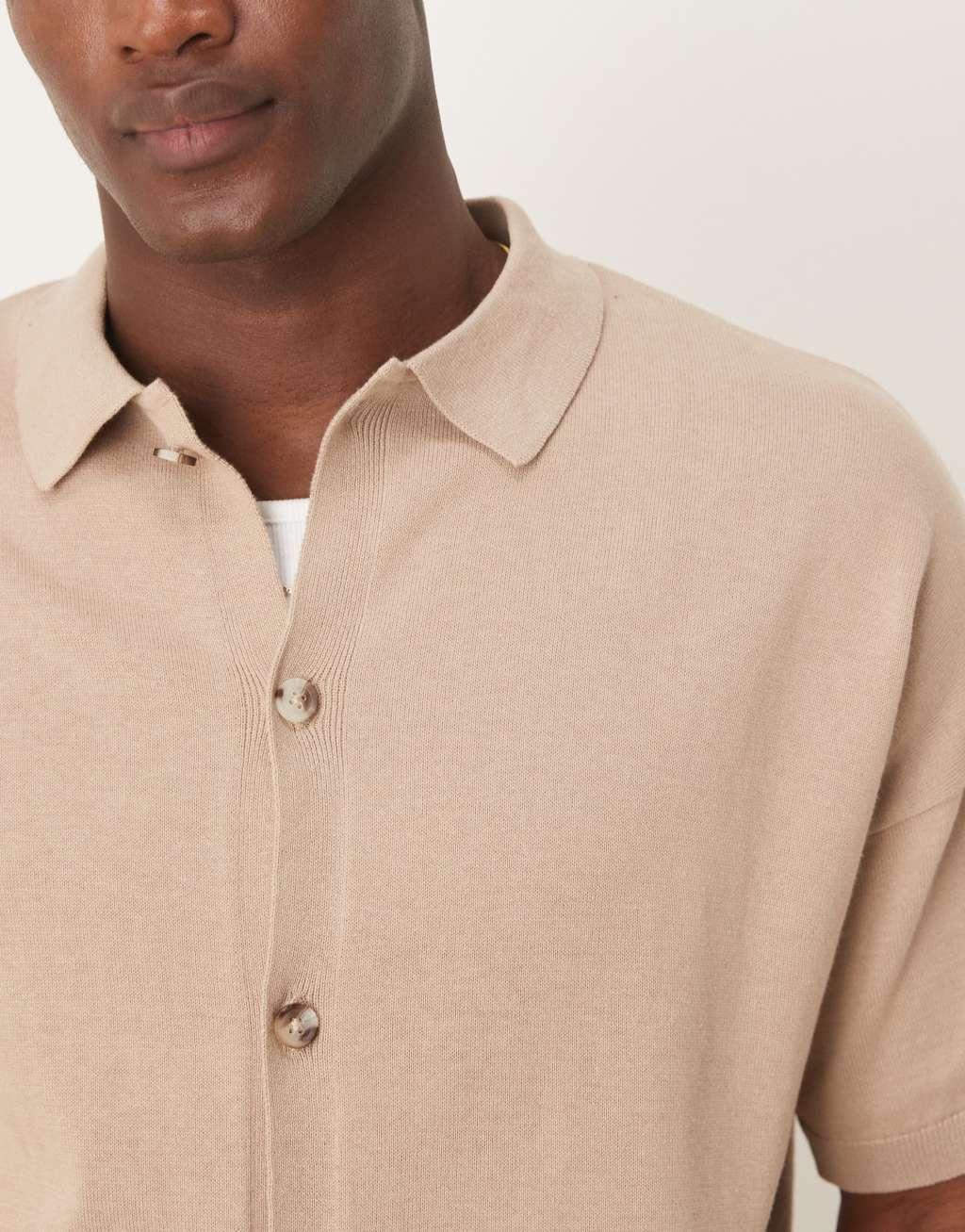 ASOS DESIGN relaxed lightweight knitted cotton button through polo in stone Product Image