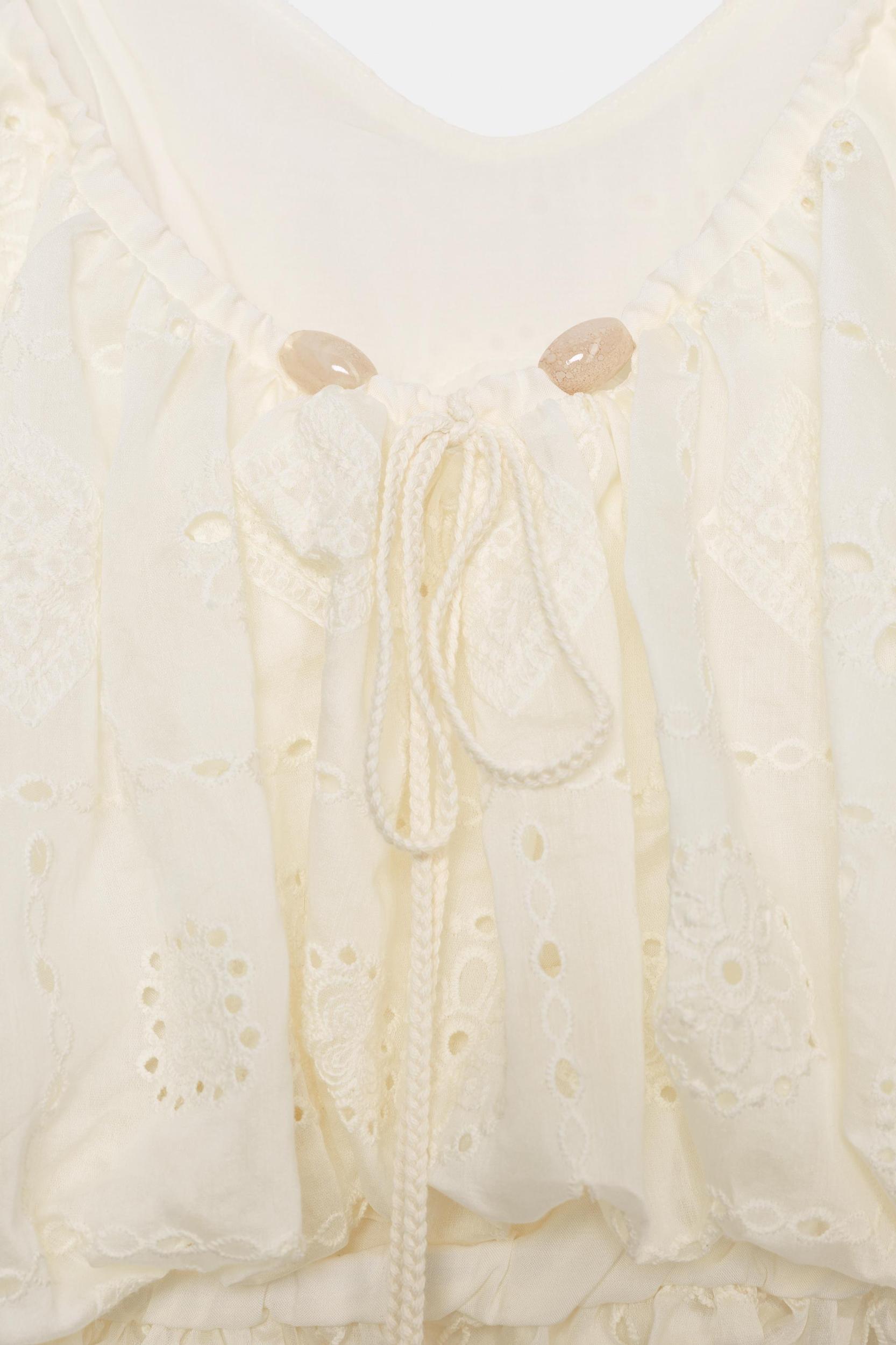 EMBROIDERED EYELET BALLOON TOP Product Image