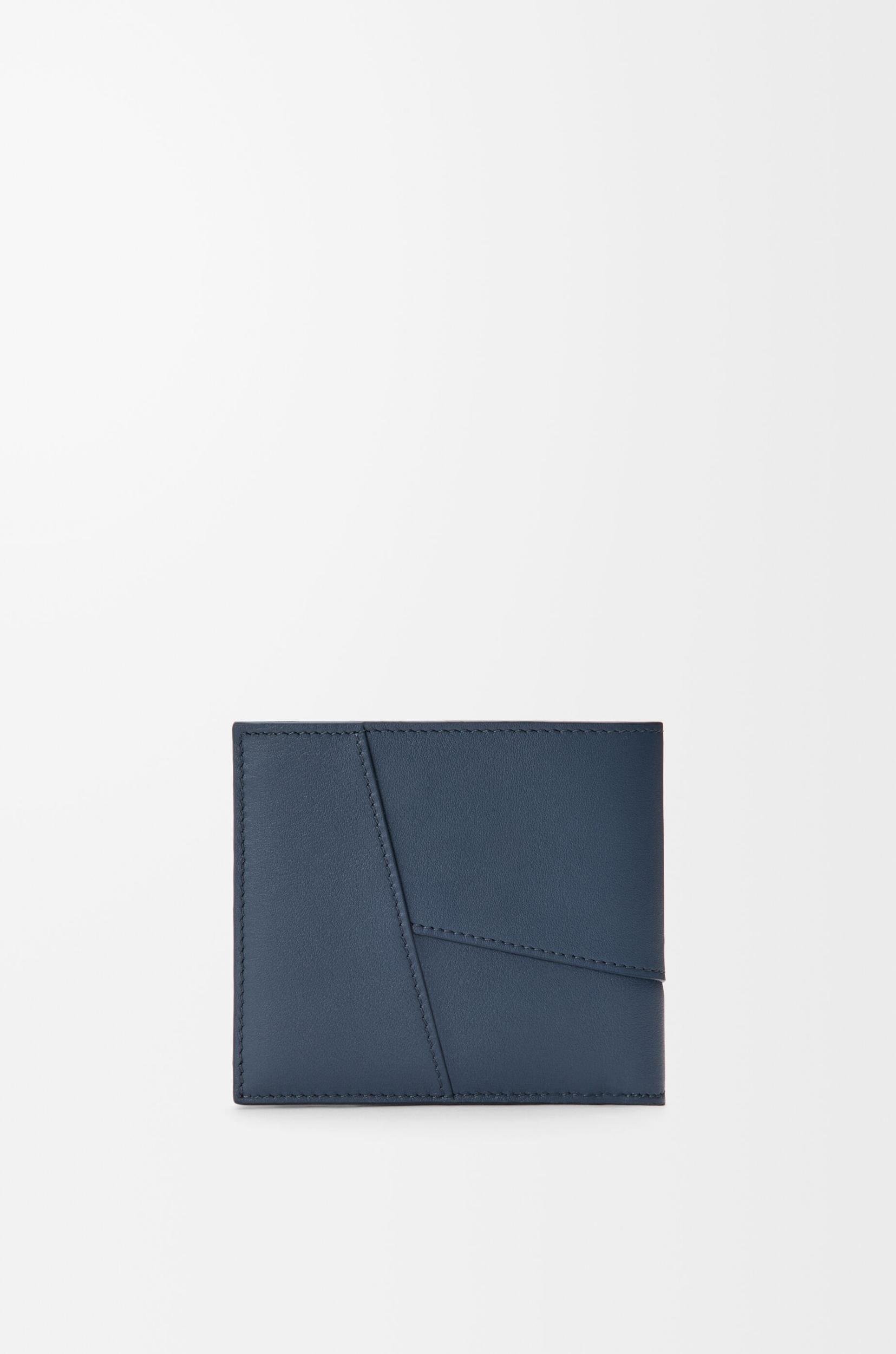 Puzzle bifold wallet in classic calfskin Product Image