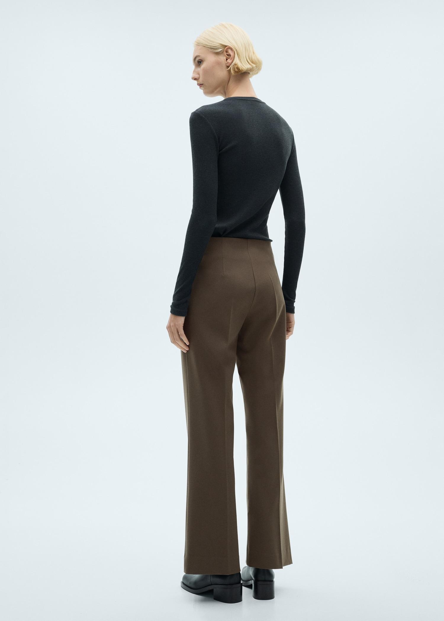 Mid-rise flare pants - Women | MANGO USA Product Image