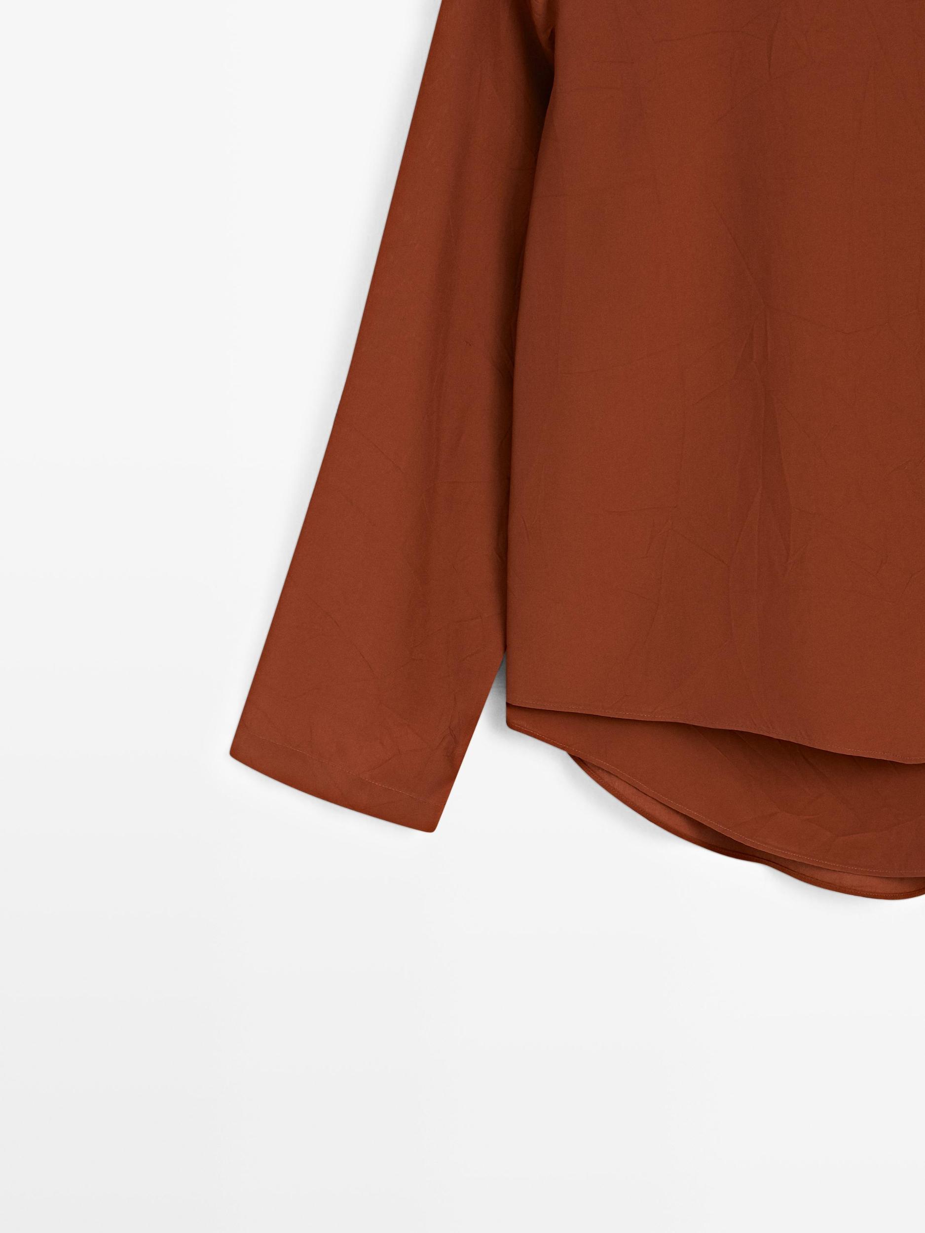 Flowing blouse with tied neck Product Image