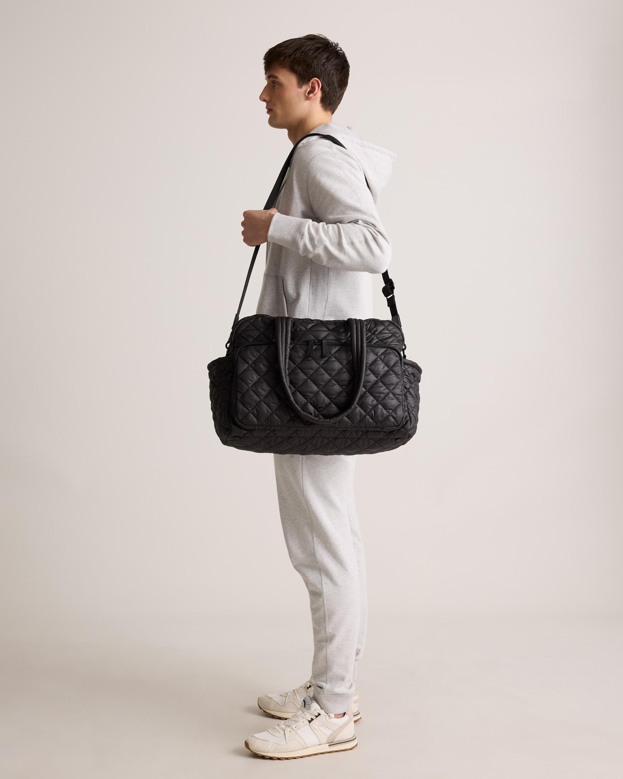 Quince | Women's Transit Quilted Duffle Bag in Black, Nylon Product Image