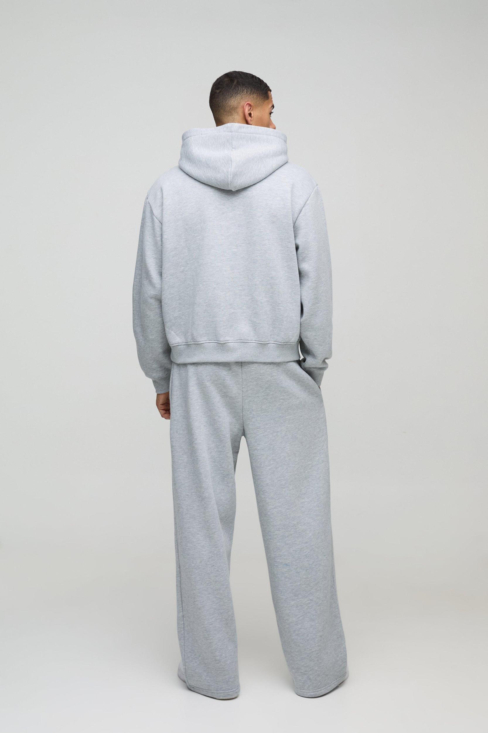 Oversized Boxy Worldwide Distressed Applique Hooded Tracksuit | boohooMAN USA Product Image