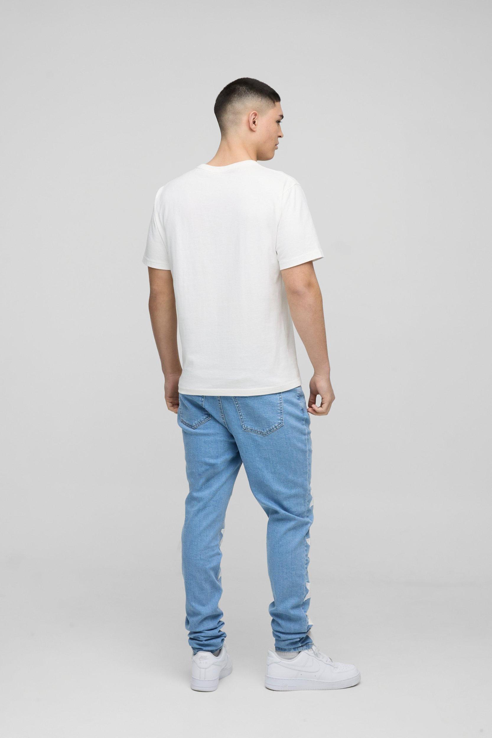 Skinny Stacked PU Star Applique Jeans | boohooMAN USA Product Image