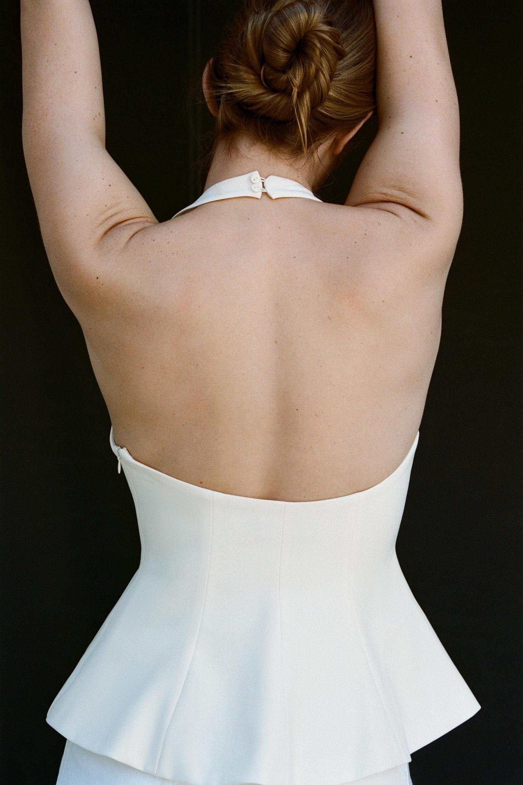 STRETCH PEPLUM TOP Product Image