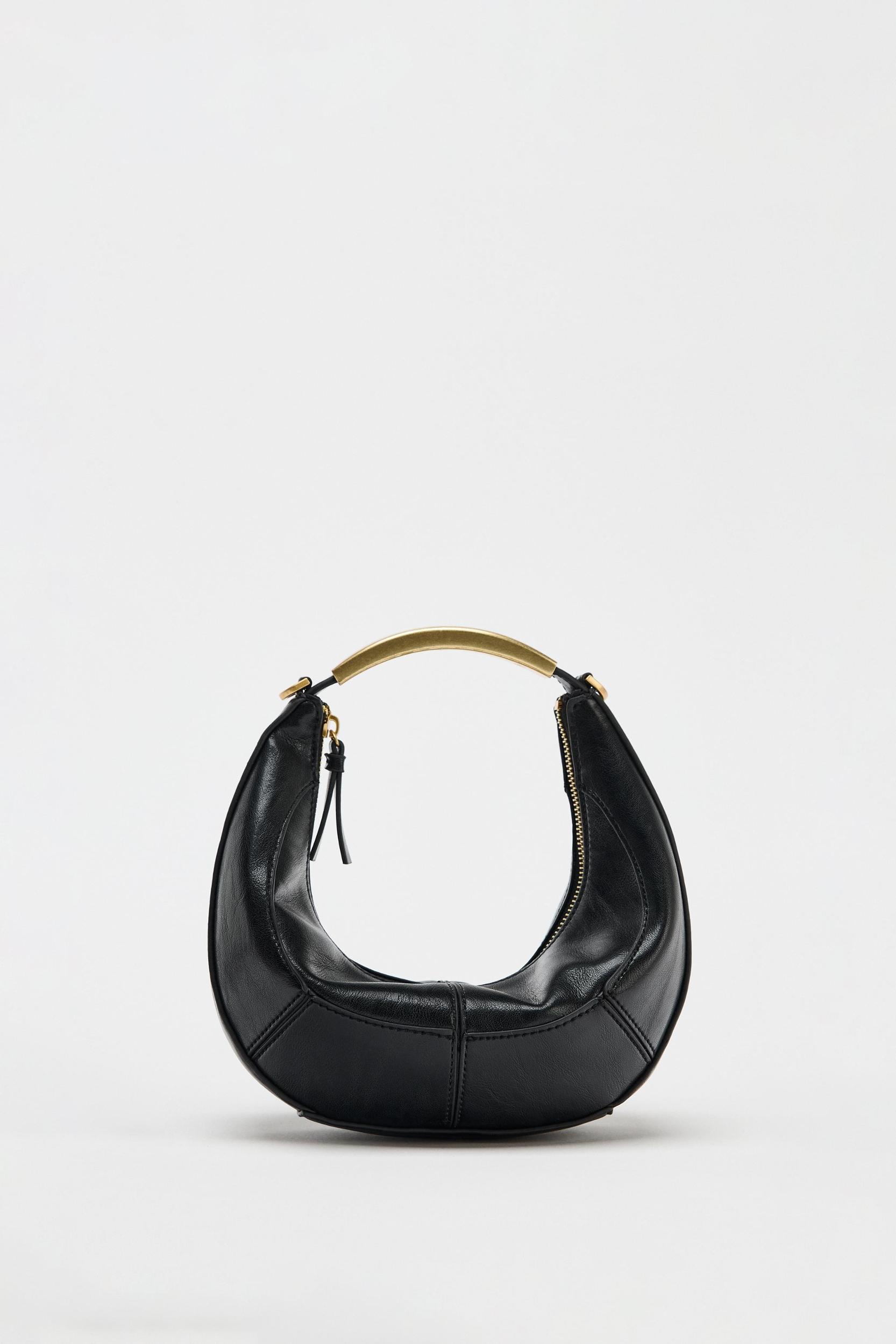 OVAL BAG WITH METAL HANDLE Product Image