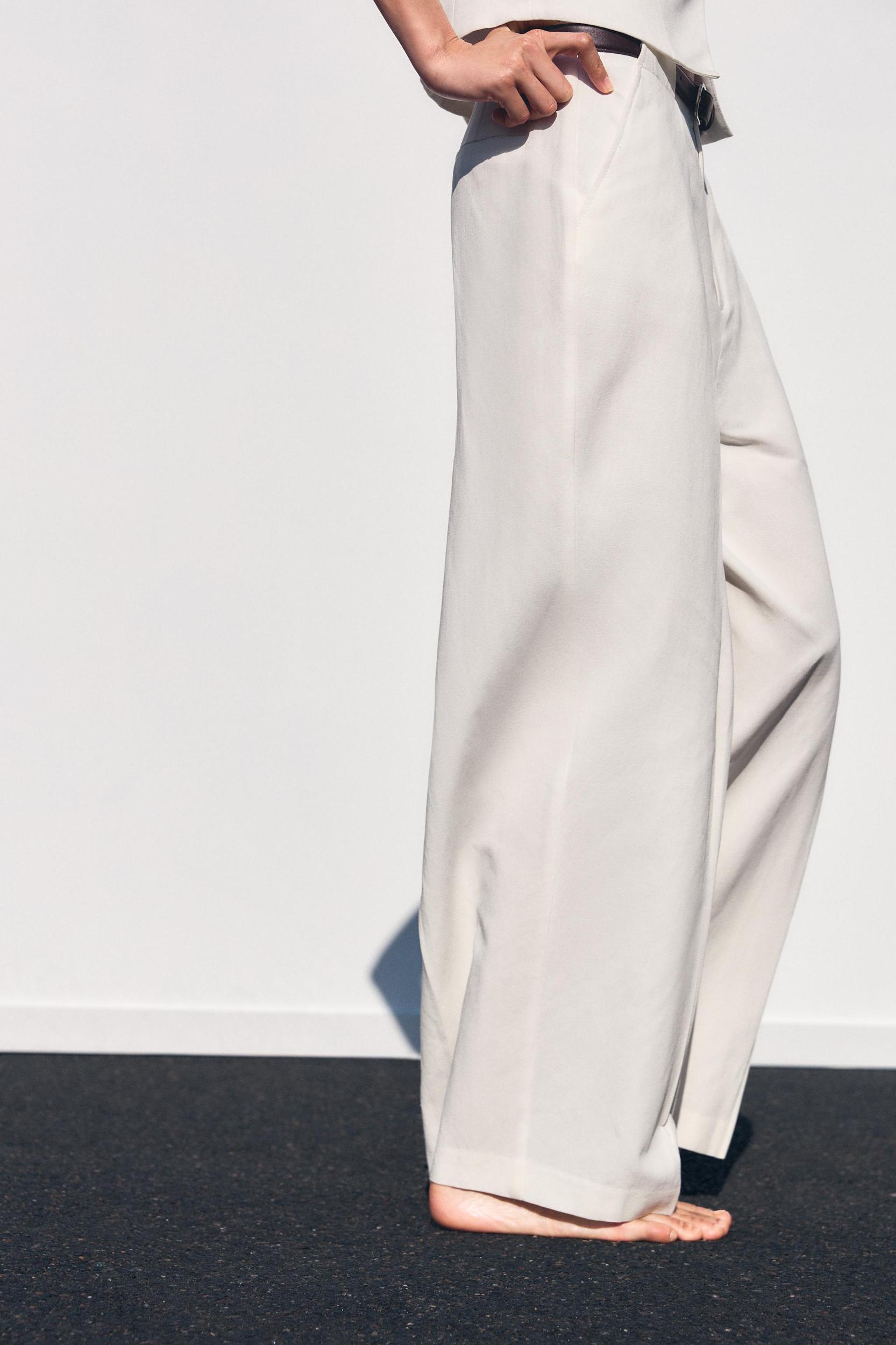 BELTED PLEATED PANTS Product Image
