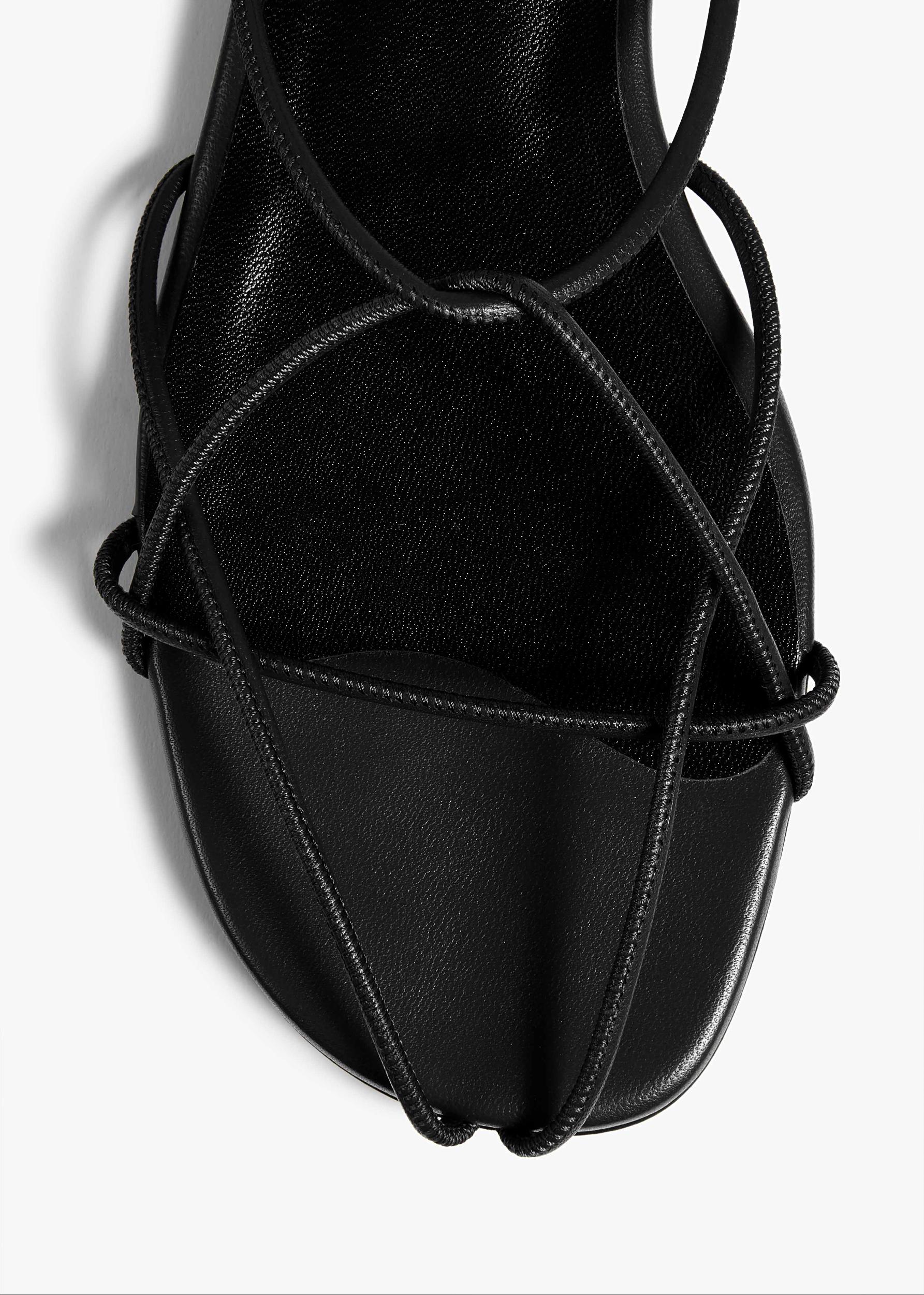 Loulou Flat Sandal in Black Leather Product Image