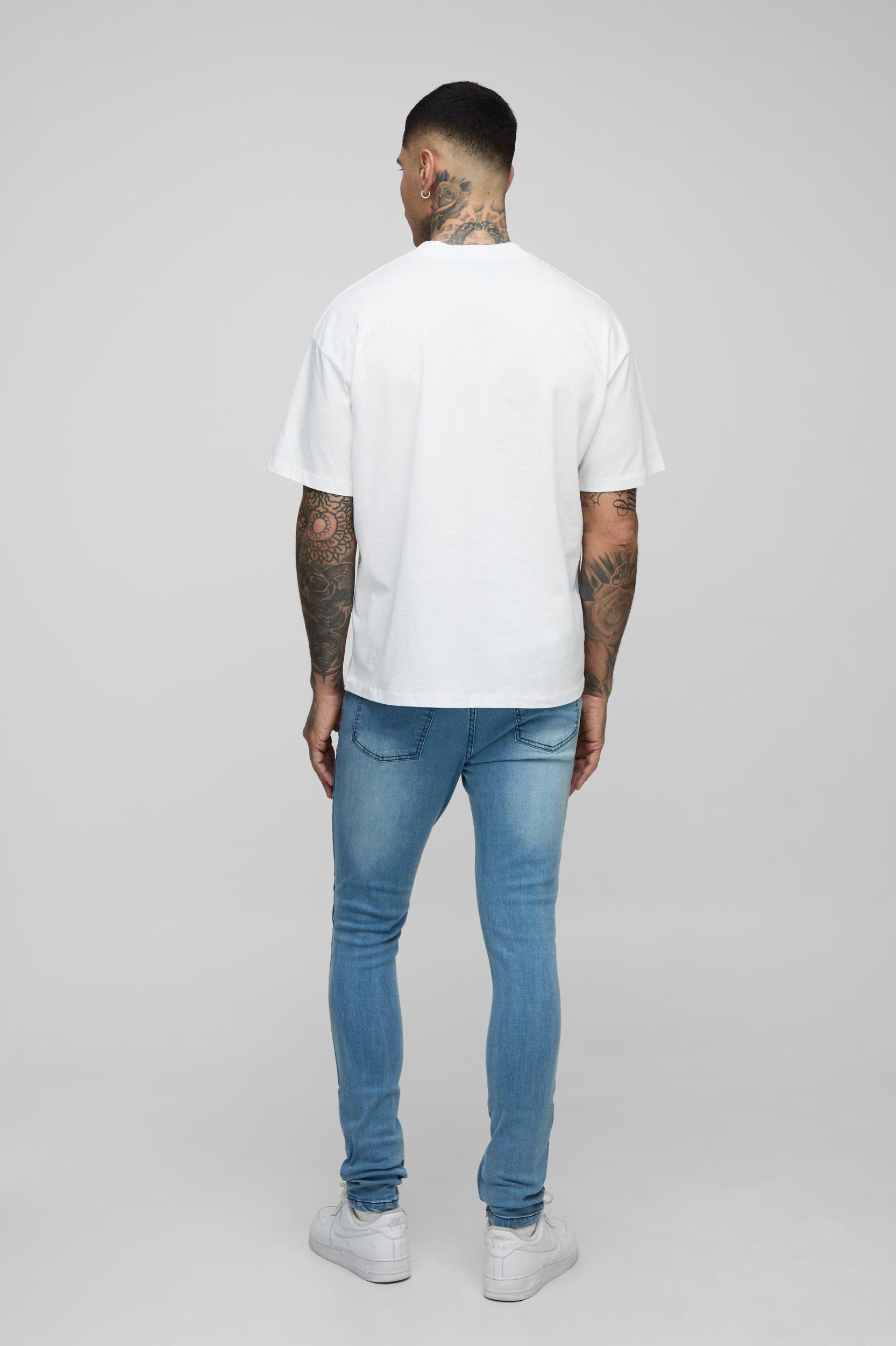 Tall Ripped Zip Hem Super Skinny Jeans | boohooMAN USA Product Image