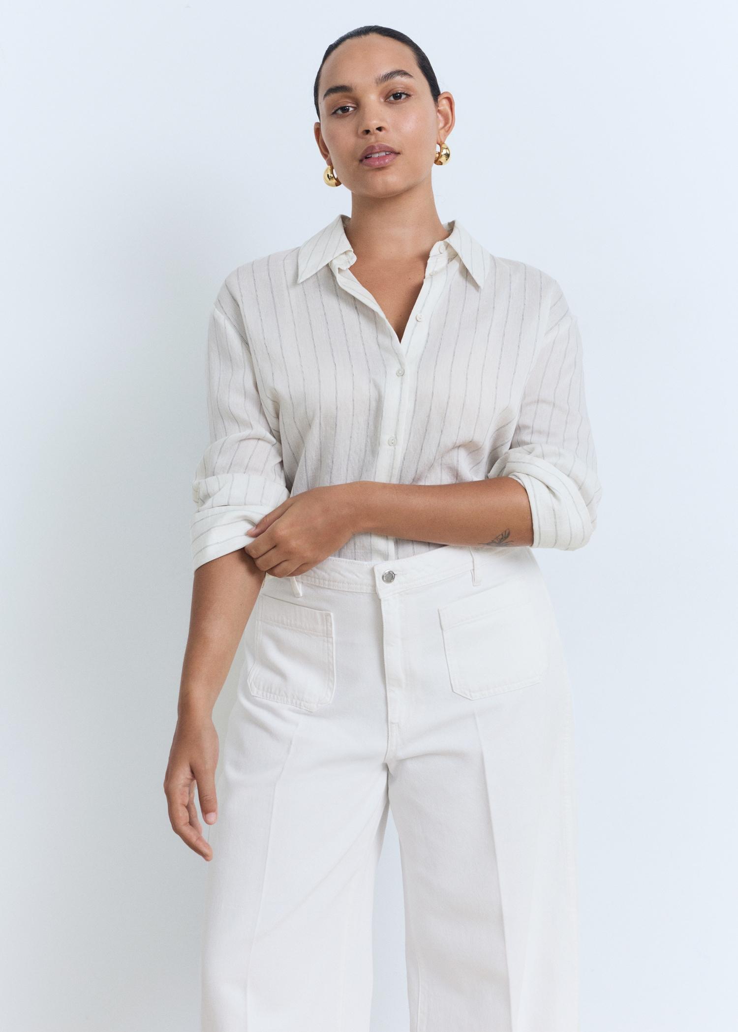 High-rise wideleg  jeans with pockets - Women | MANGO USA Product Image