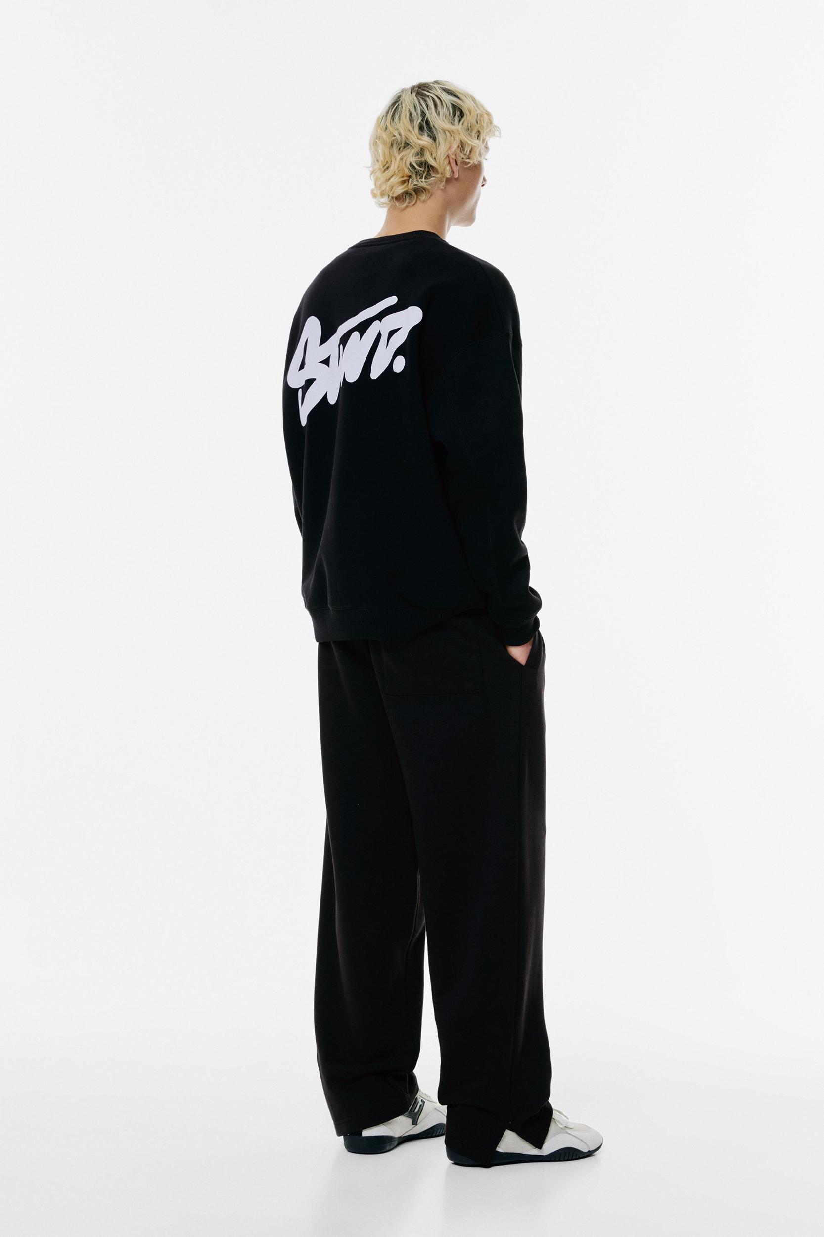 Jogger sweatpants with slits Product Image