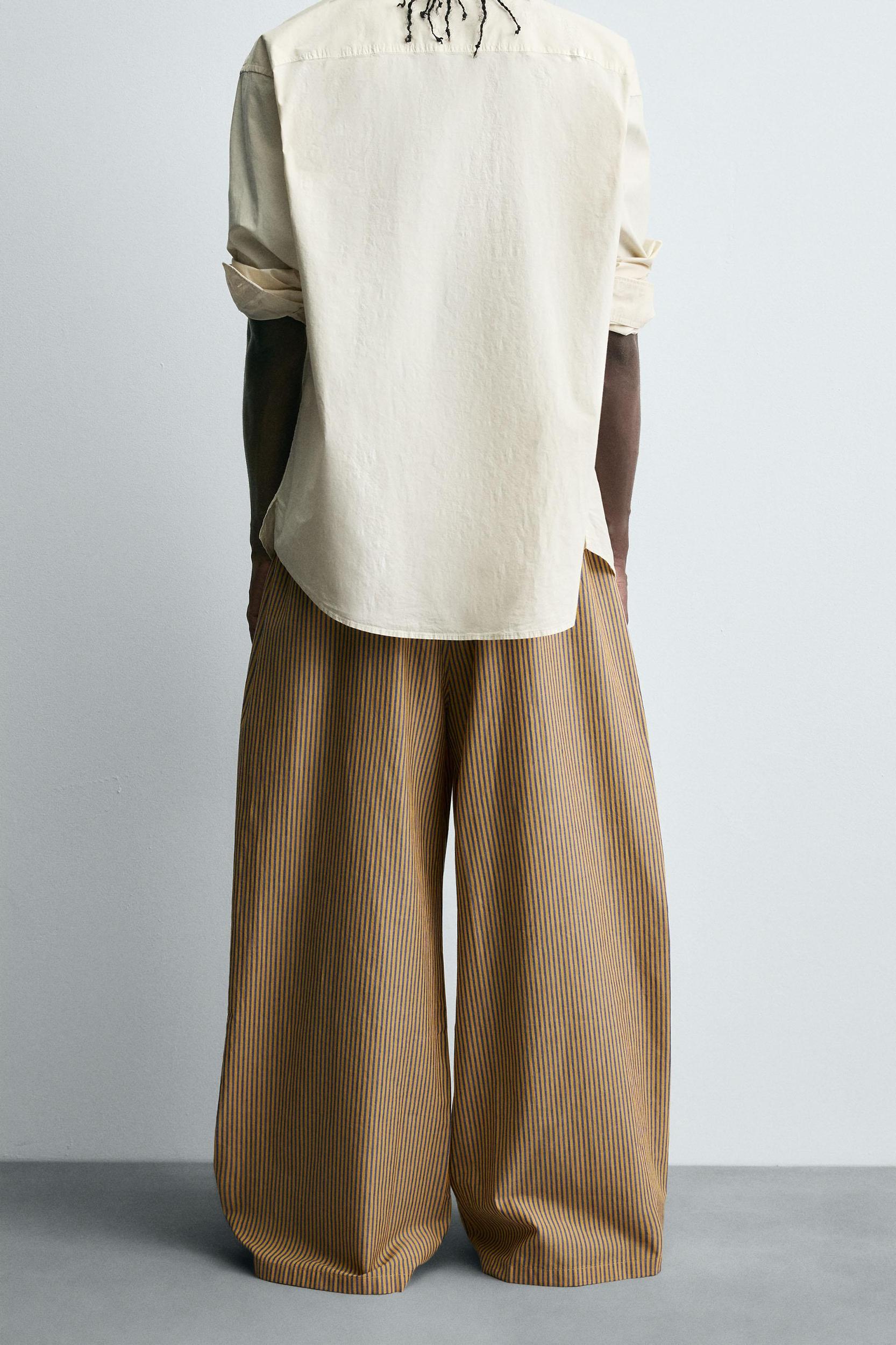 STRIPED OVERSIZED FIT PANTS Product Image