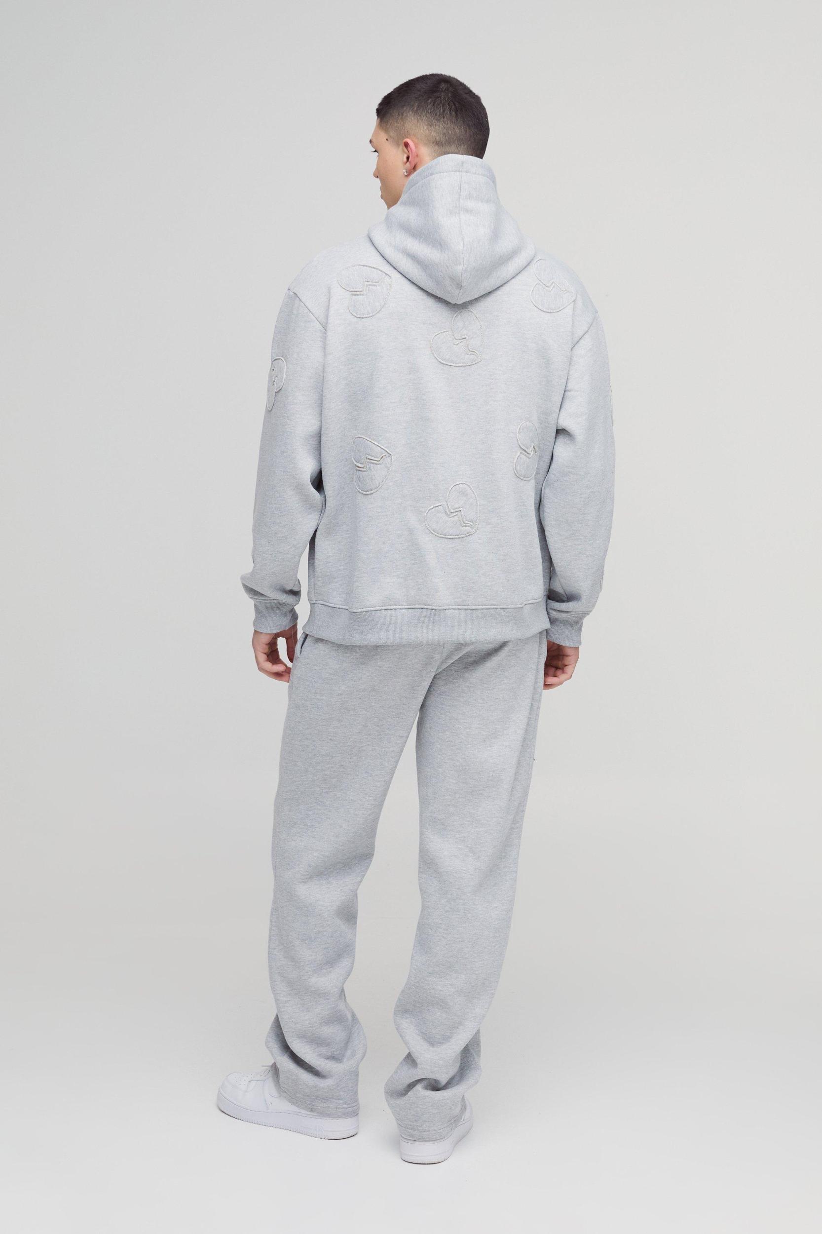 Oversized Boxy All Over Heart Applique Tracksuit | boohooMAN USA Product Image