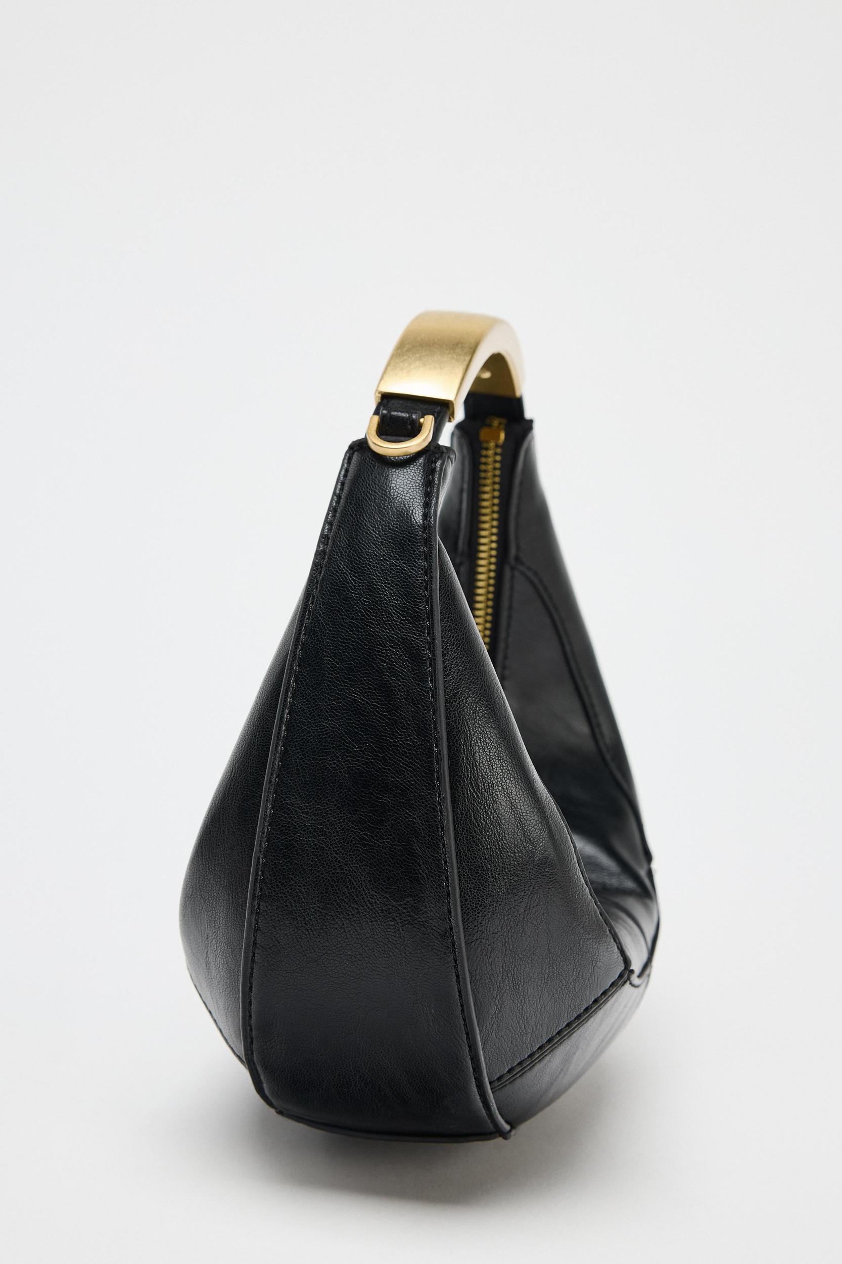OVAL BAG WITH METAL HANDLE Product Image