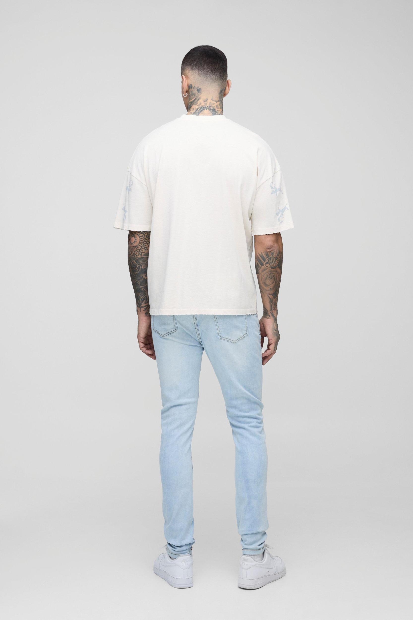 Tall Skinny Stretch Ripped Bleach Wash Jean | boohooMAN USA Product Image