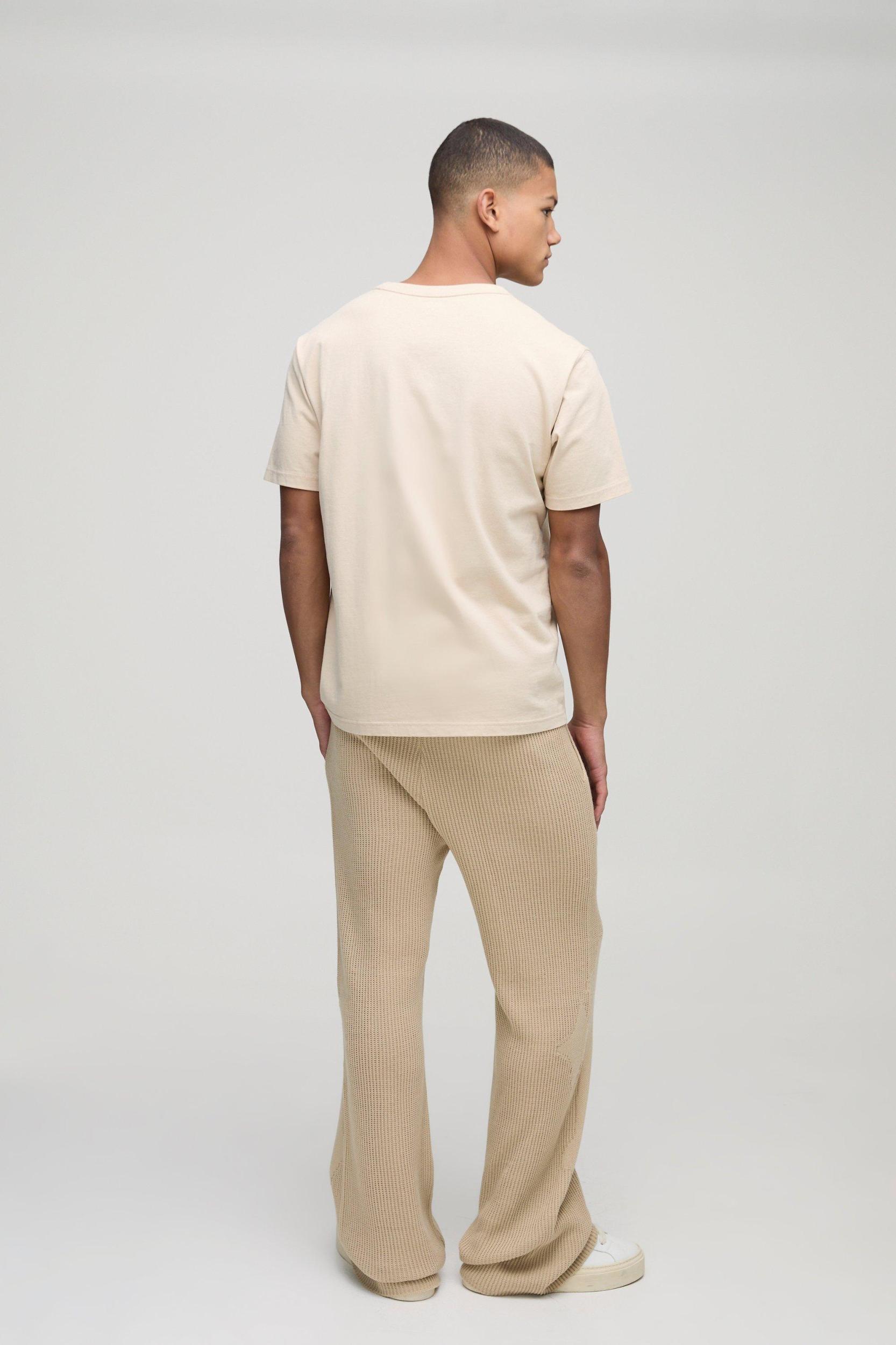 Slim Fit Flared Ribbed Cross Knitted Sweatpants | boohooMAN USA Product Image