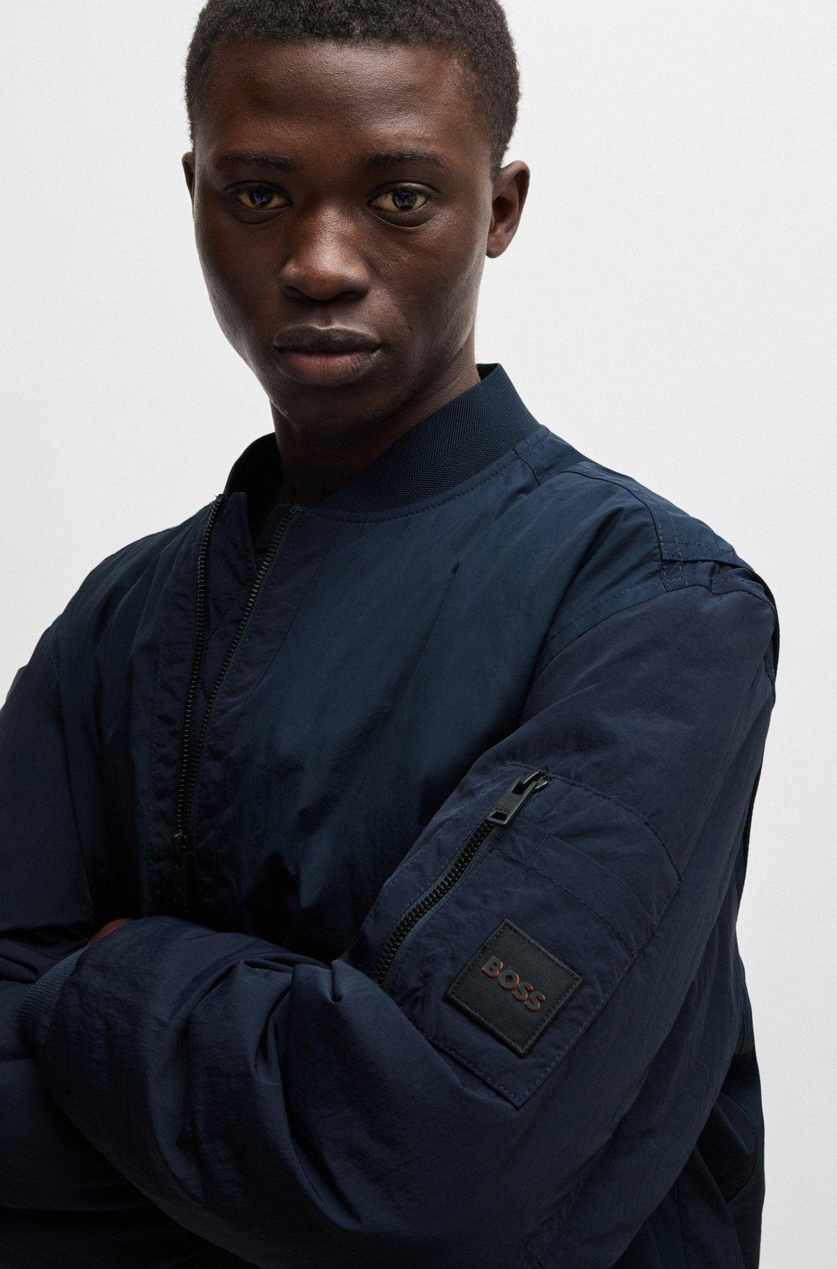 BOSS - Water-repellent bomber jacket with logo badge - Dark Blue Product Image