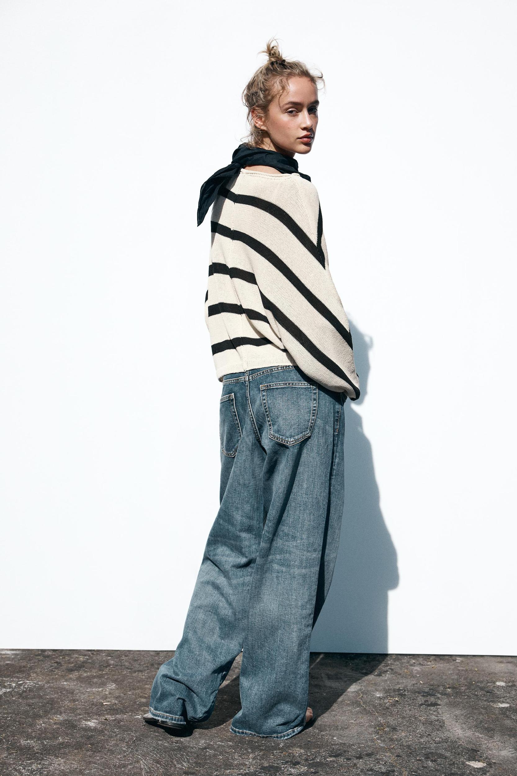 STRIPED KNIT SWEATER Product Image