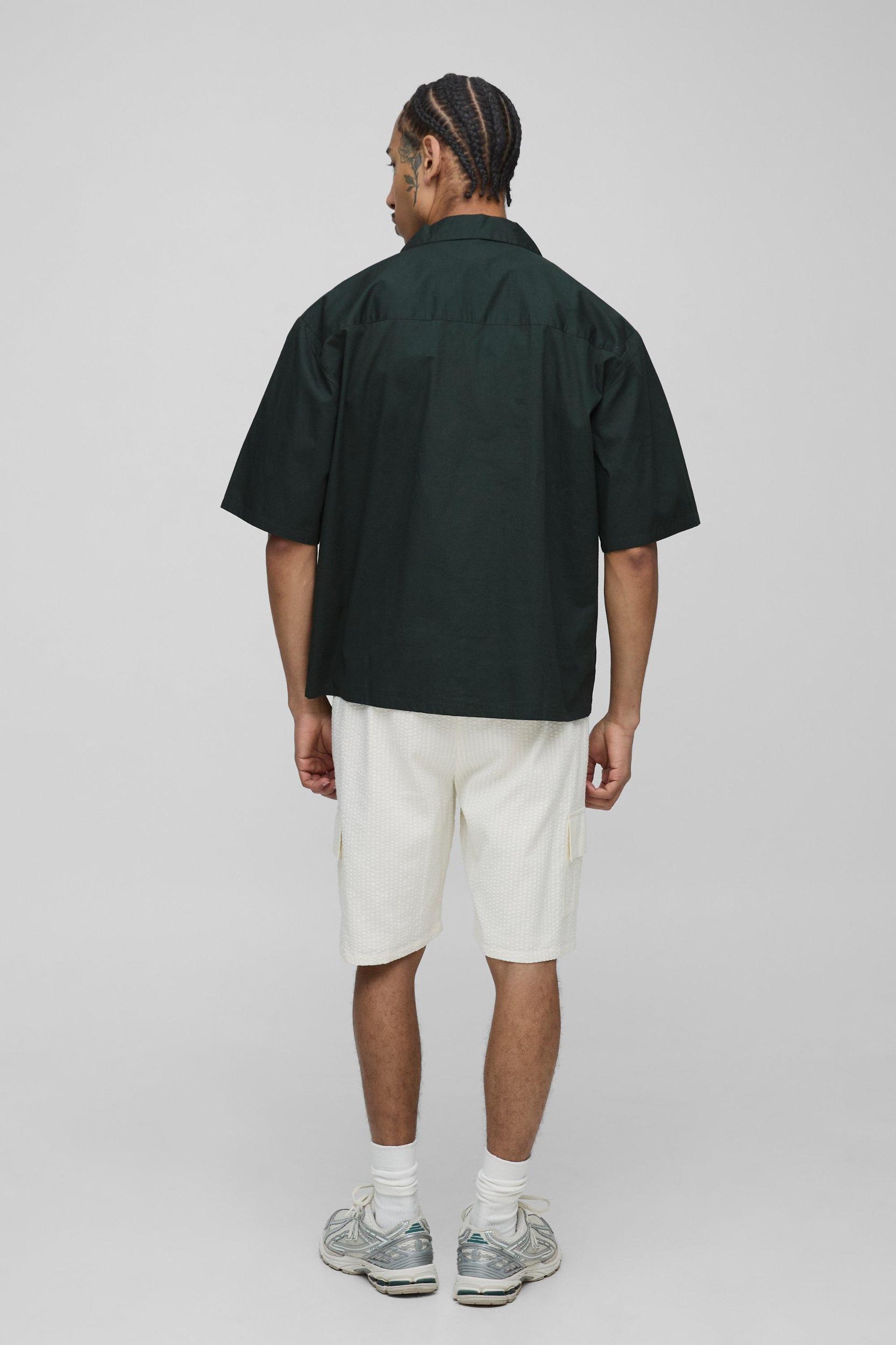 Relaxed Elasticated Waist Seersucker Cargo Short | boohooMAN USA Product Image