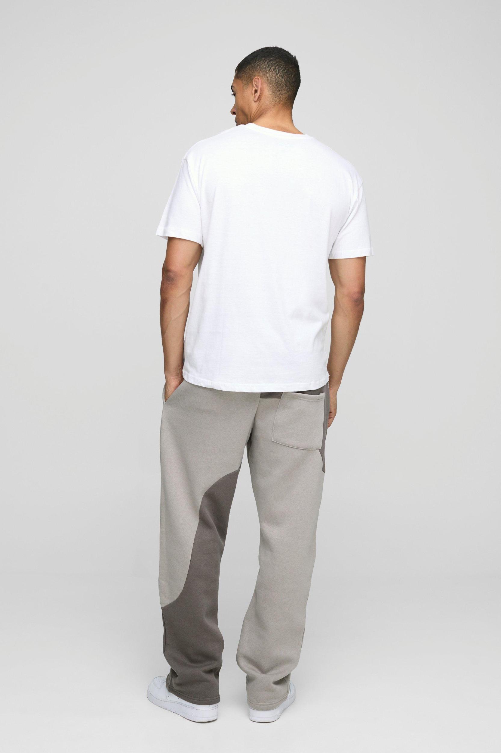 Relaxed Fit Man Curved Colour Block Sweatpants | boohooMAN USA Product Image