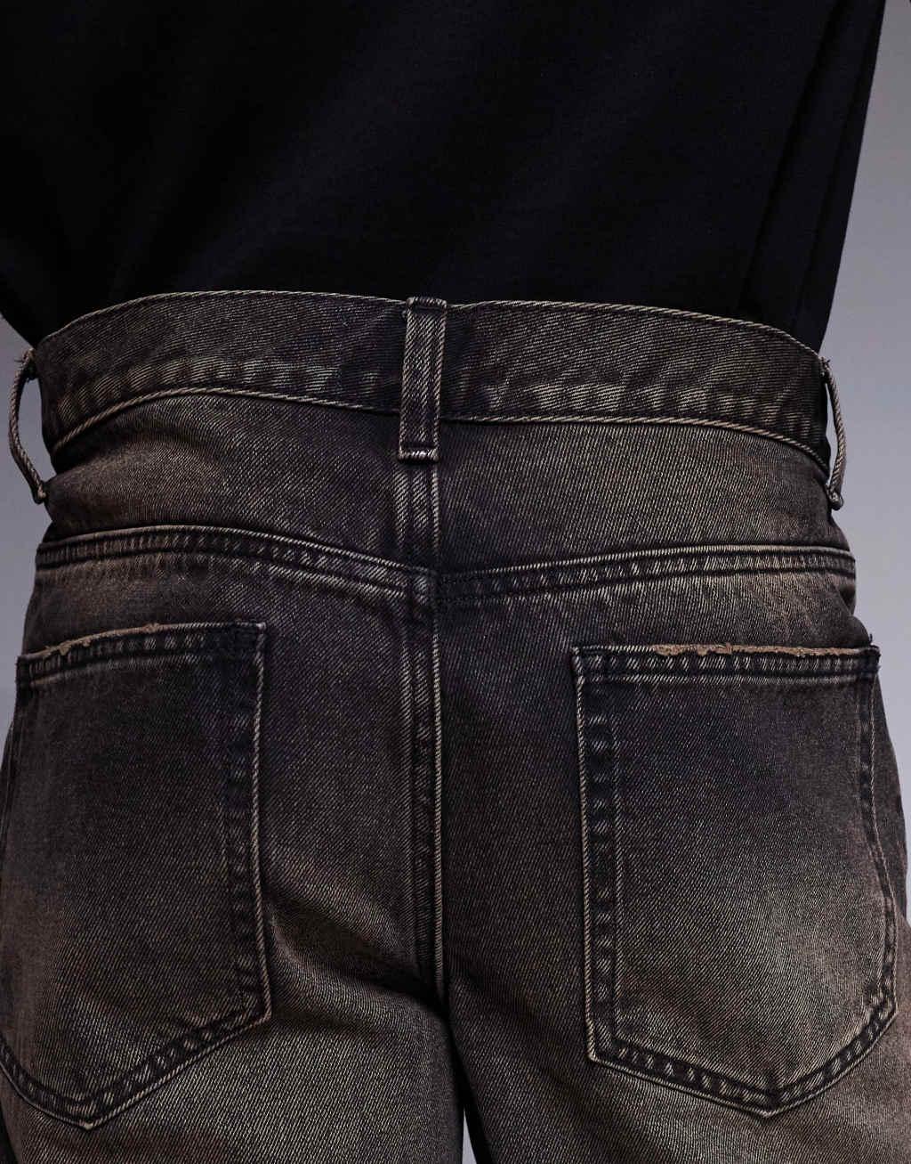 ASOS DESIGN wide flare fit jeans with brown tint in washed black Product Image