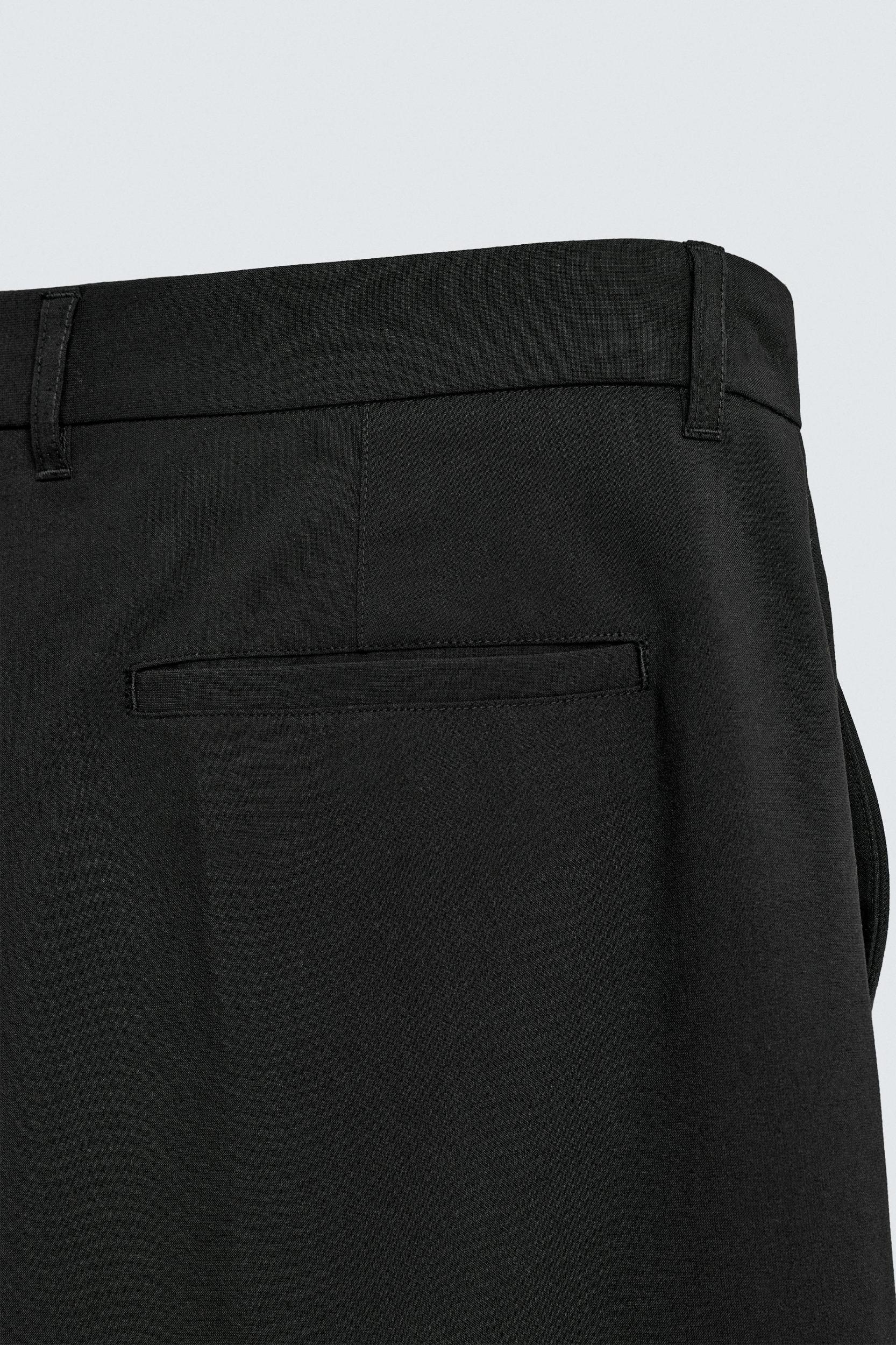 PLEATED SUIT PANTS Product Image