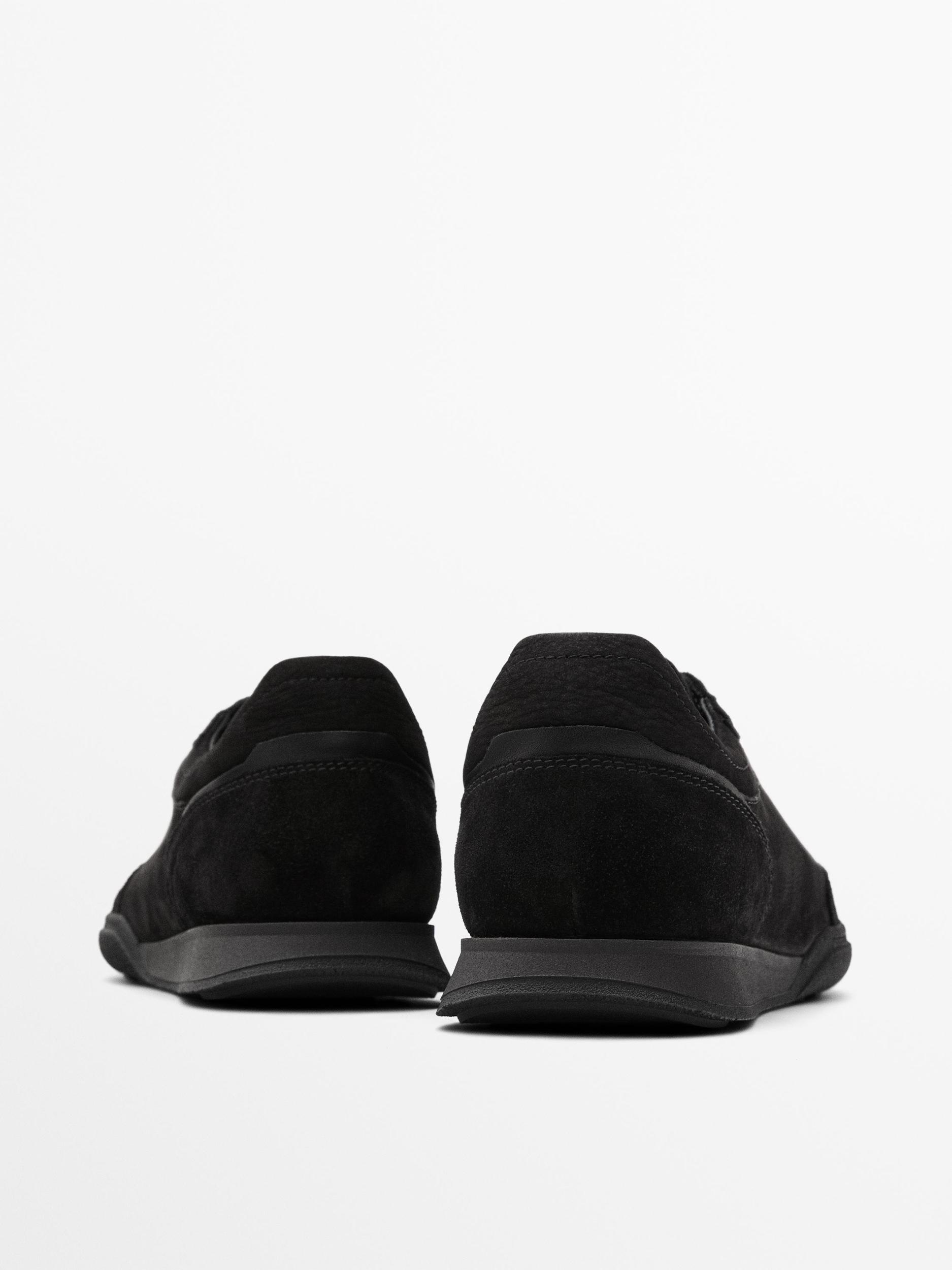 Split leather trainers with contrast soles Product Image