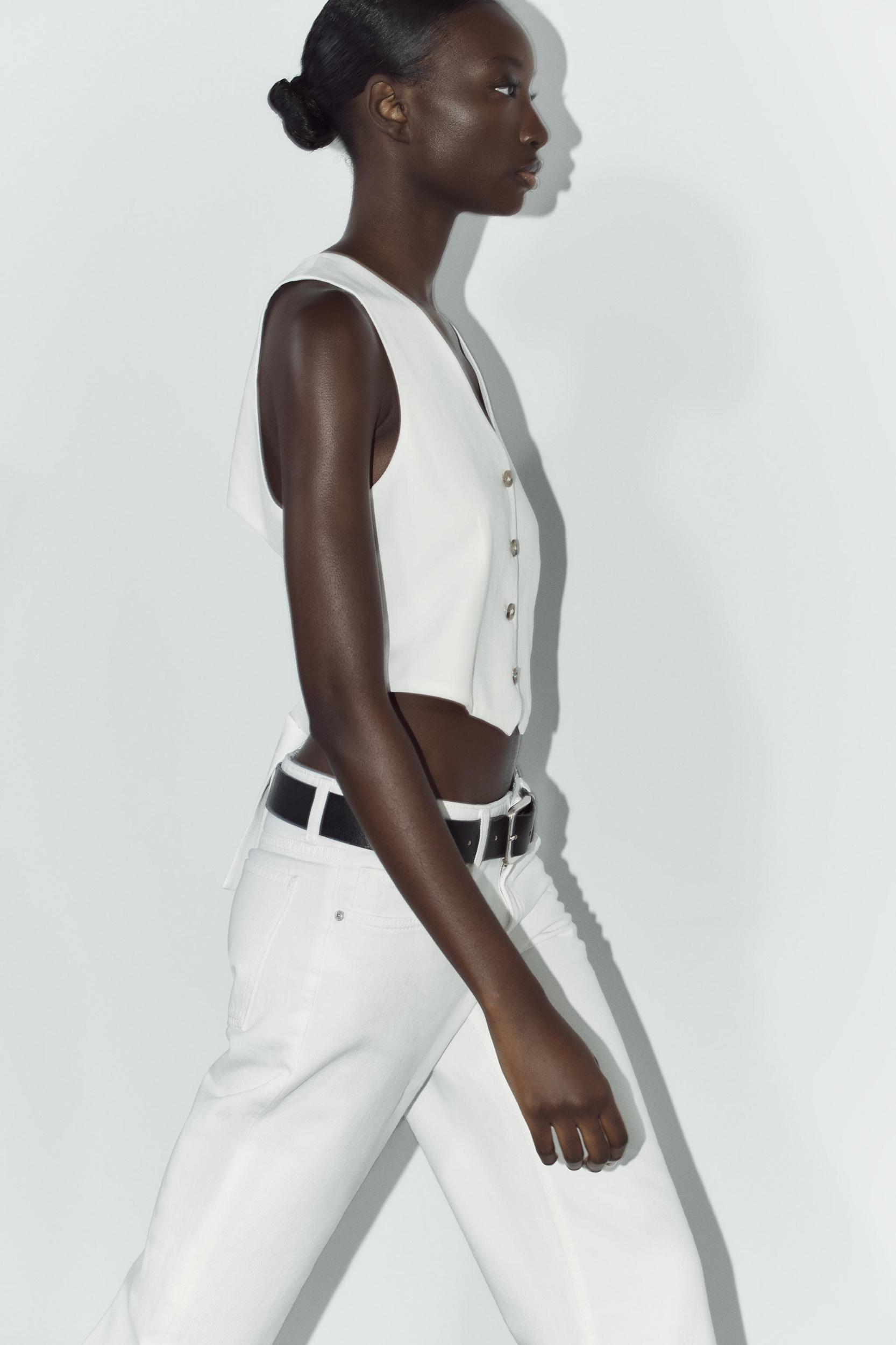 BACK CUT OUT VEST Product Image