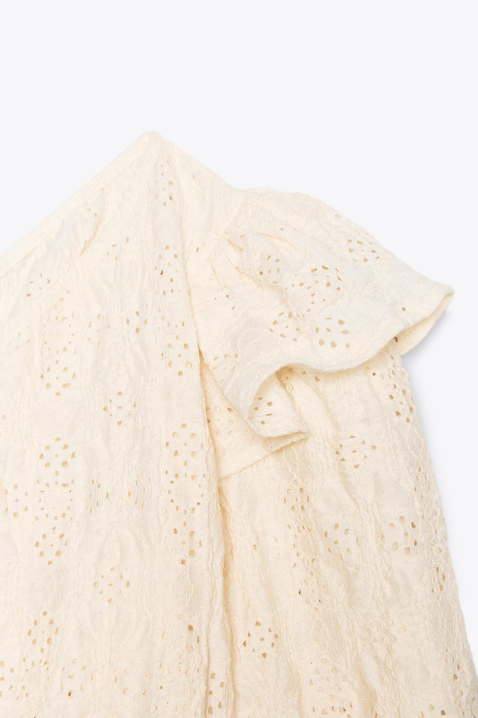 EMBROIDERED ASYMMETRIC TOP Product Image