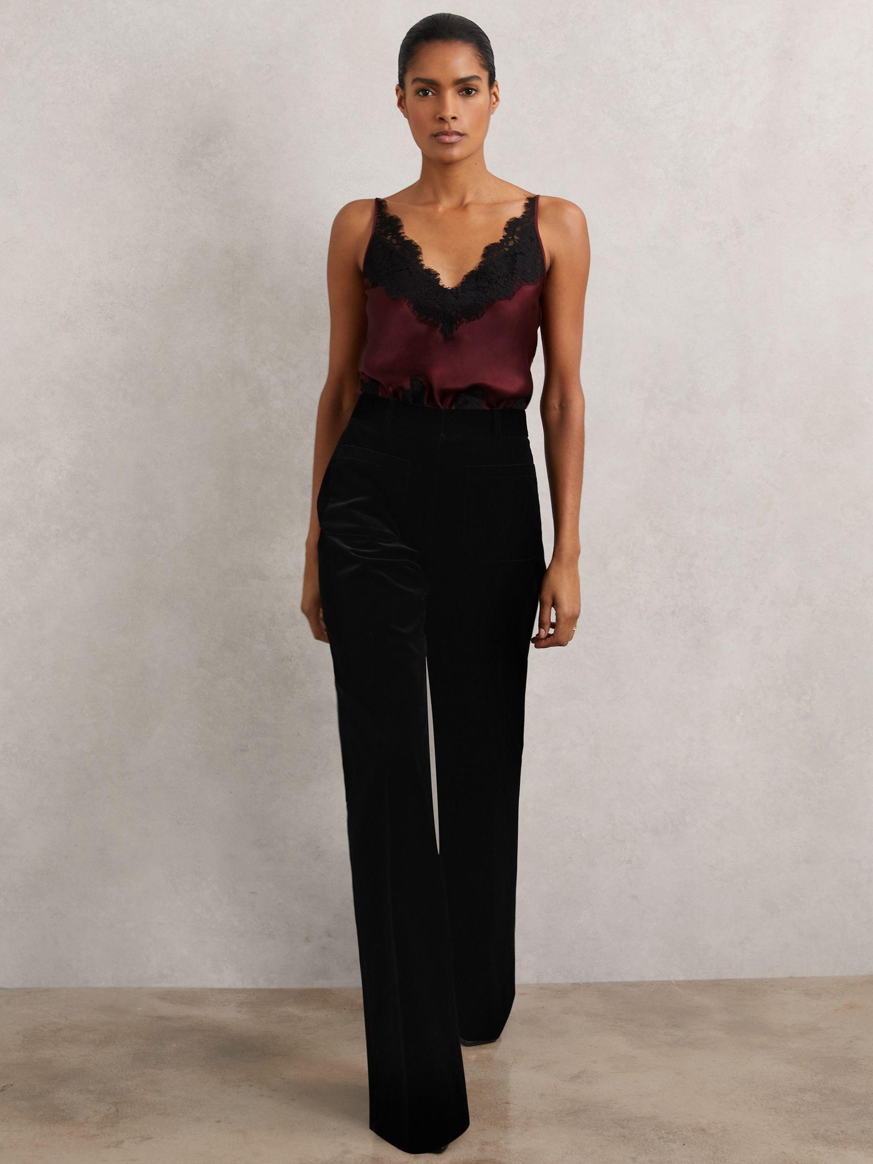 Petite Velvet Flared Trousers in Black Product Image