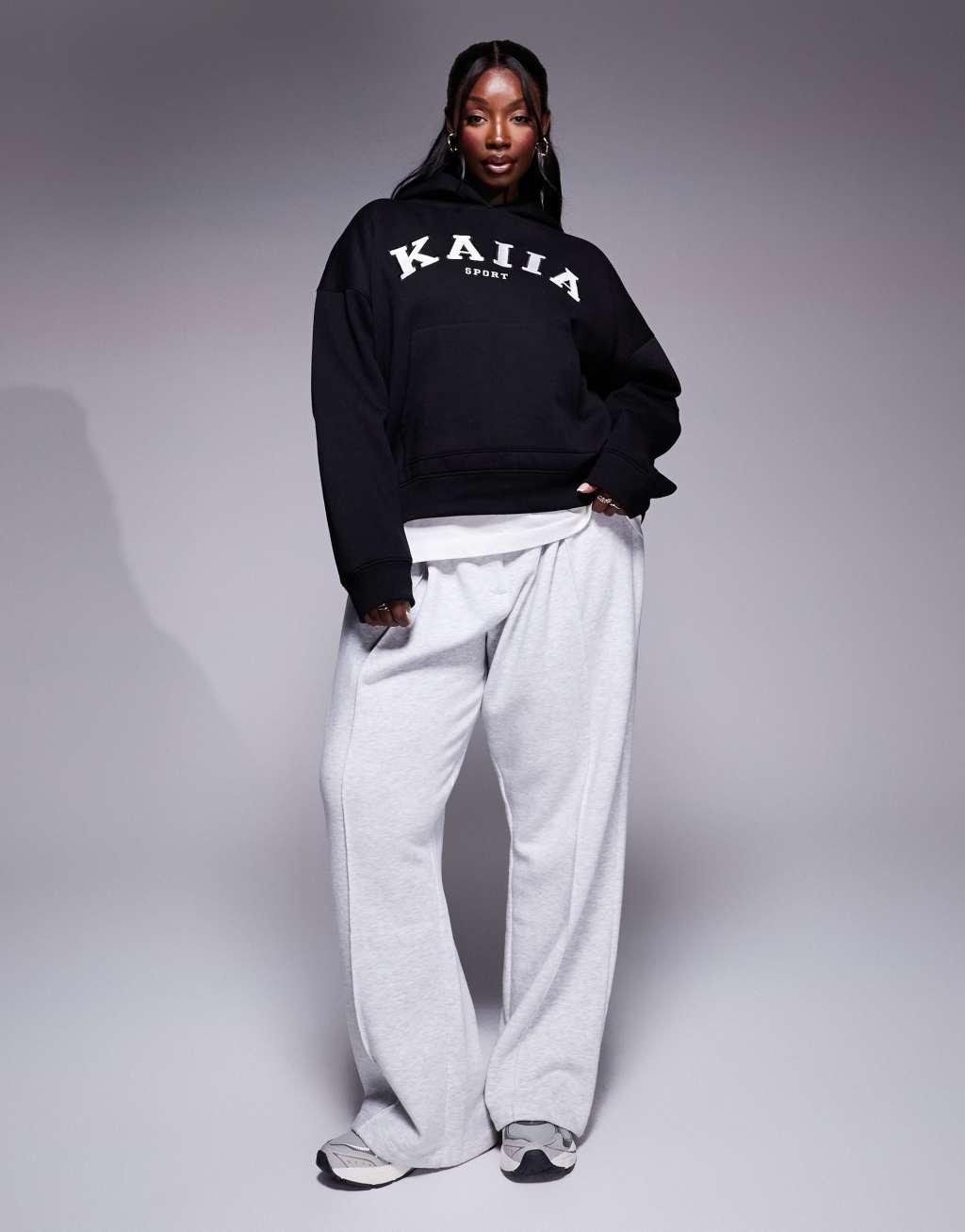 Kaiia Plus logo oversized hoodie in black Product Image