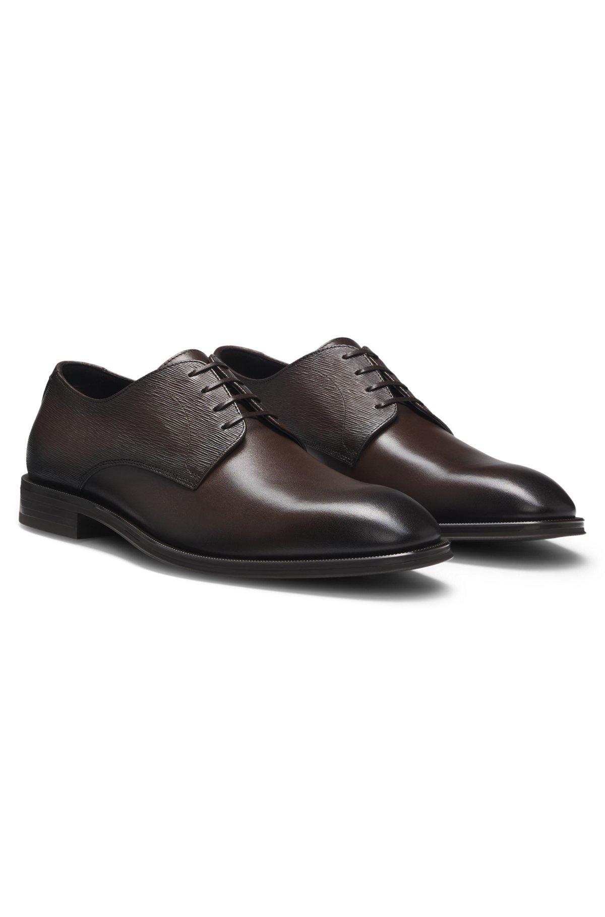 Plain and structured Derby shoes in leather Product Image