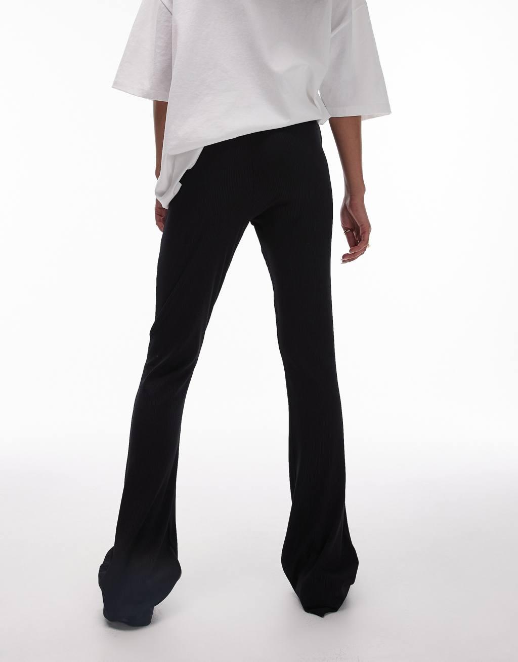 Topshop skinny rib flared pants in black Product Image