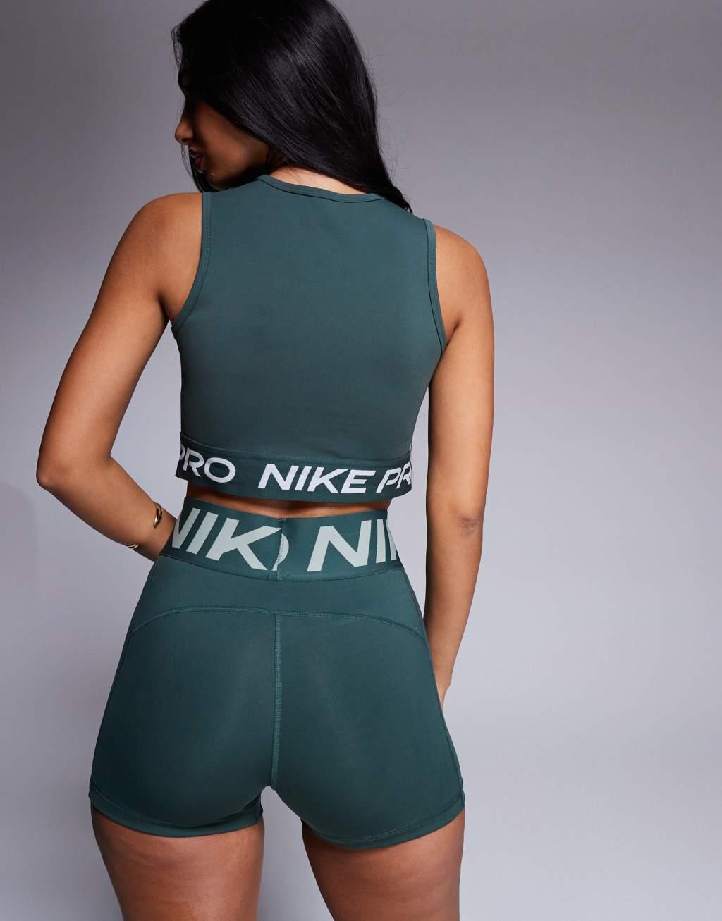 Nike Pro Training 365 cropped tank top in dark green Product Image