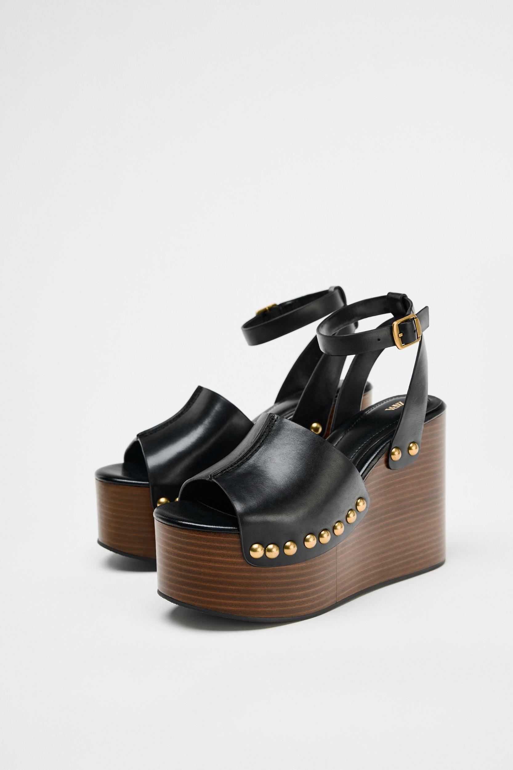 STUDDED LEATHER WEDGE SANDALS Product Image